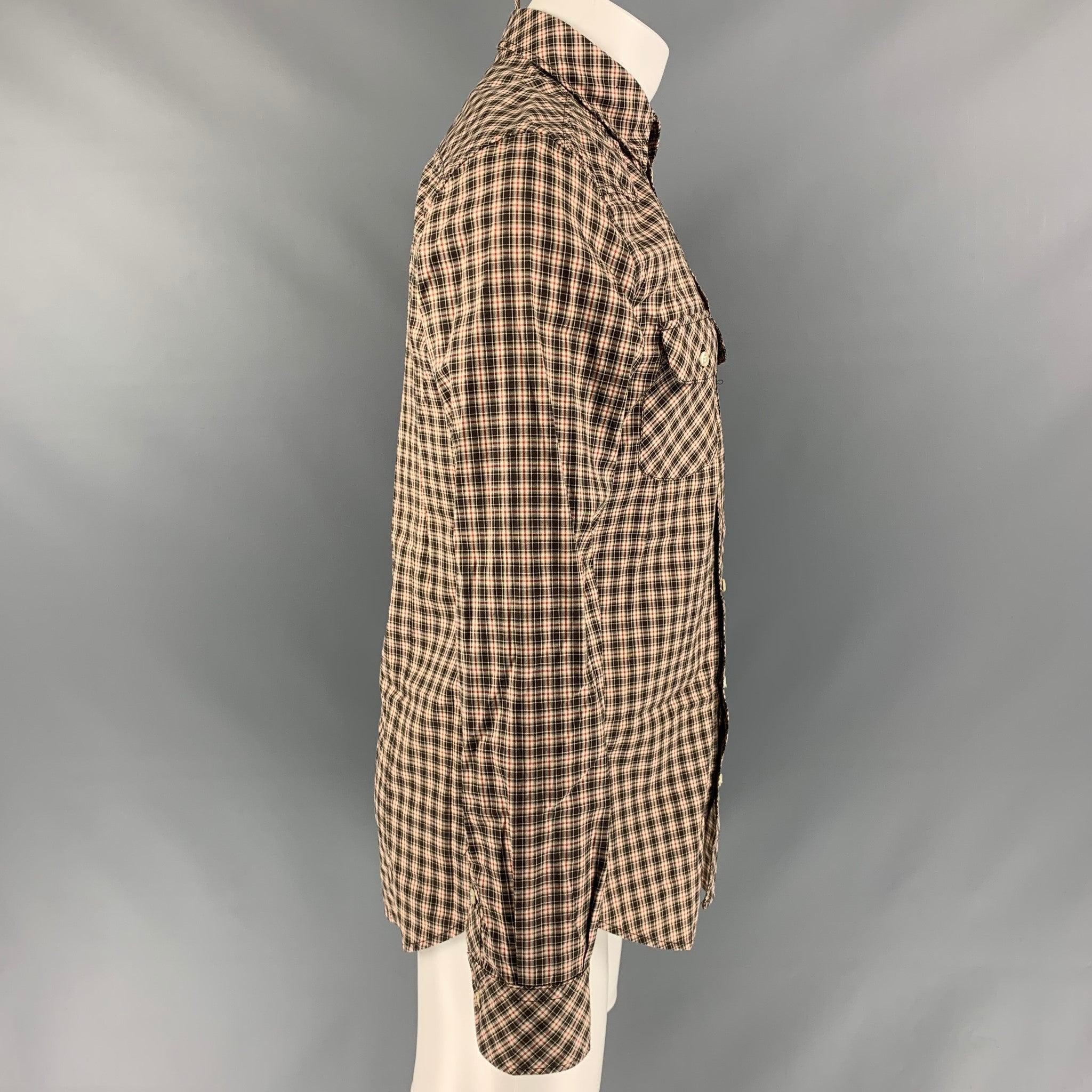 D&G by DOLCE & GABBANA 'Brad' long sleeve shirt comes in brown, white and red checkered cotton featuring a spread collar, patch pockets, a buttoned closure and one button angle cuff. Excellent Pre-Owned Condition. 

Marked:   15.5/ 40