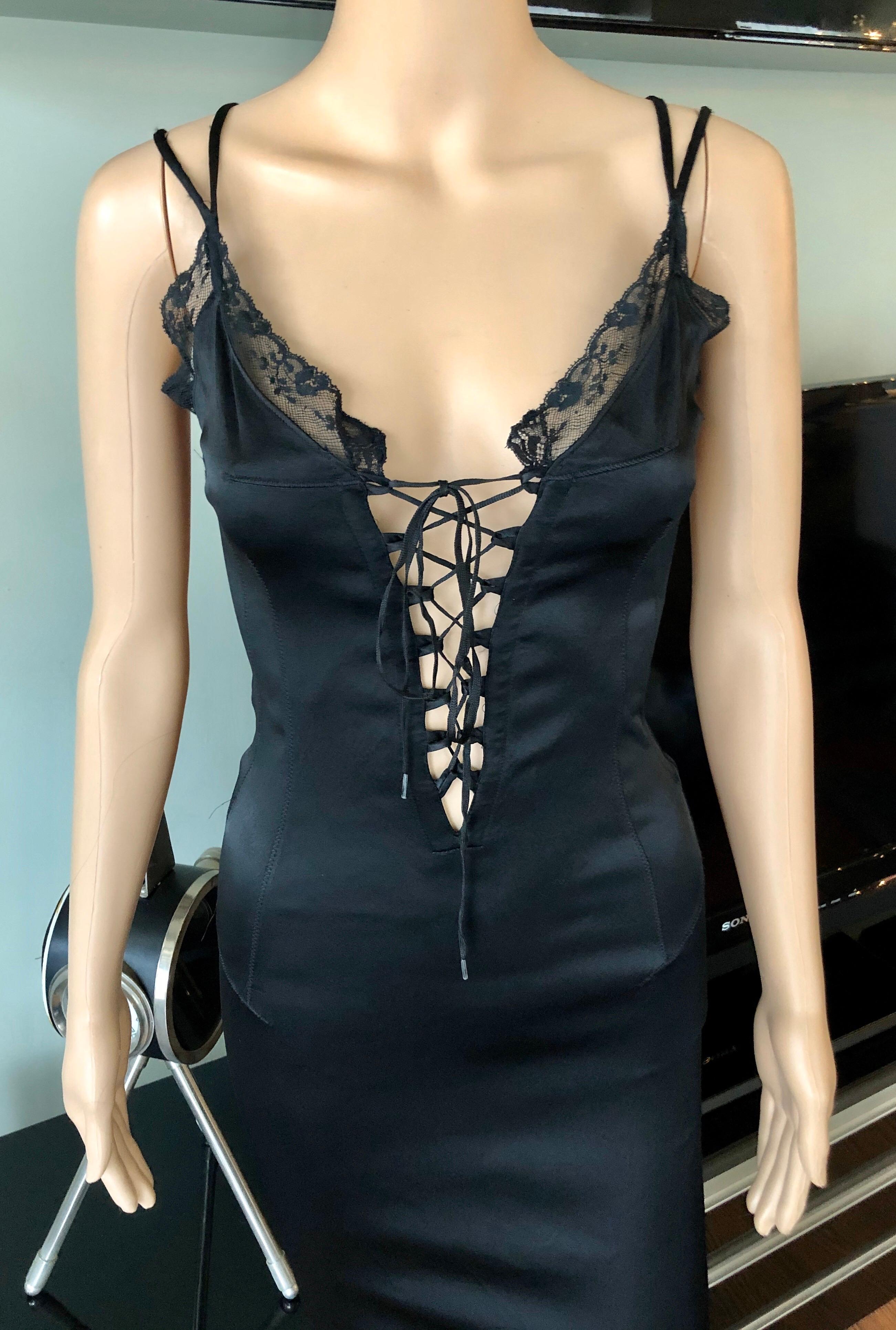 D&G by Dolce & Gabbana c. 2001 Corset Lace Up Black Dress

Please note size and fabric tags are missing. Please find the approximate measurements below:
Chest: 28-34