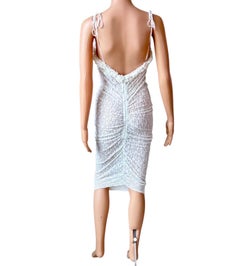 Vestido blanco de encaje transparente de D&G by Dolce & Gabbana, desfile Primavera-Verano 2006