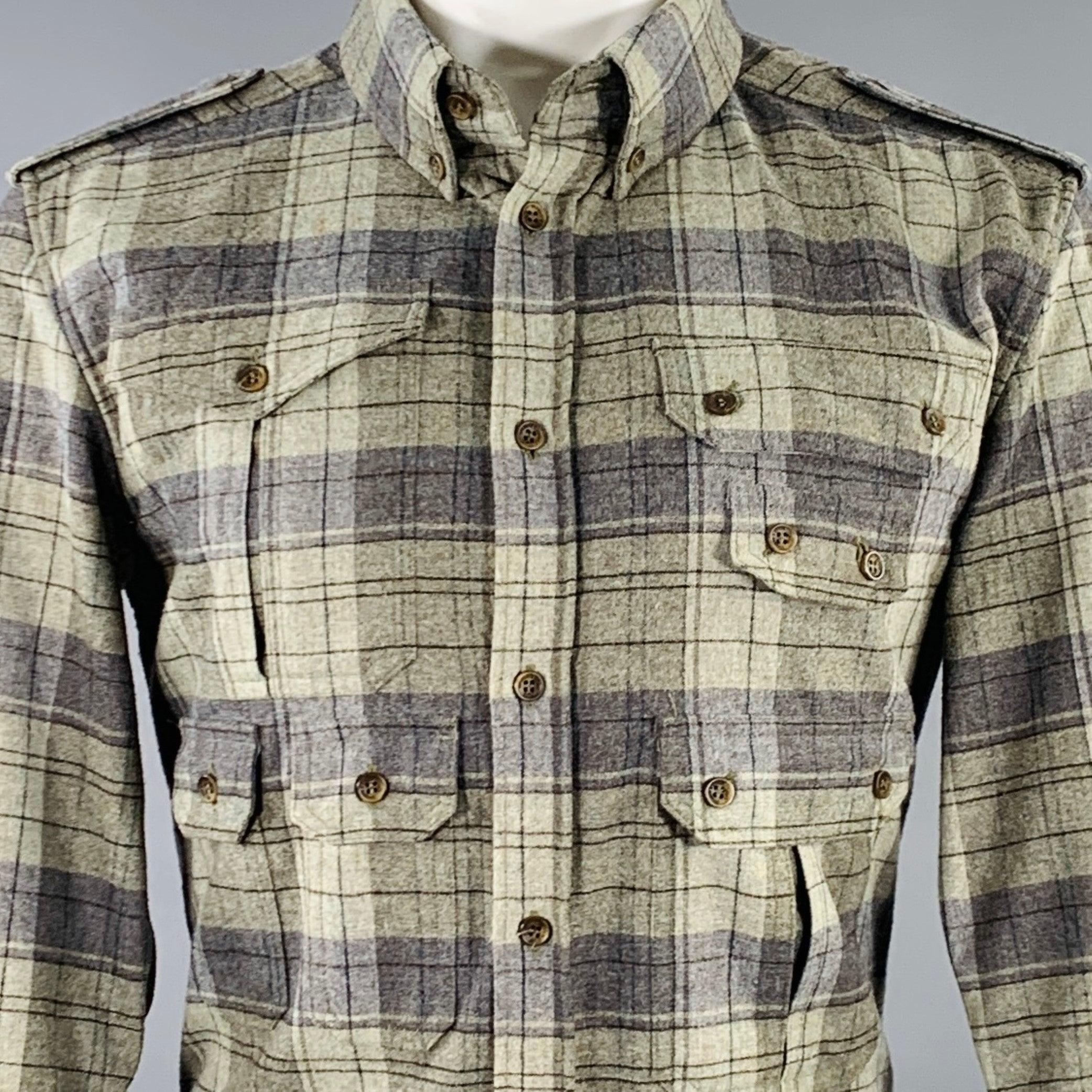 D&G by DOLCE & GABBANA long sleeve shirt
in a green and grey wool blend featuring a plaid pattern, multiple utilitarian pockets, slim fit, and button closure. Excellent Pre-Owned Condition. 

Marked:   IT 50 

Measurements: 
 
Shoulder: 17 inches