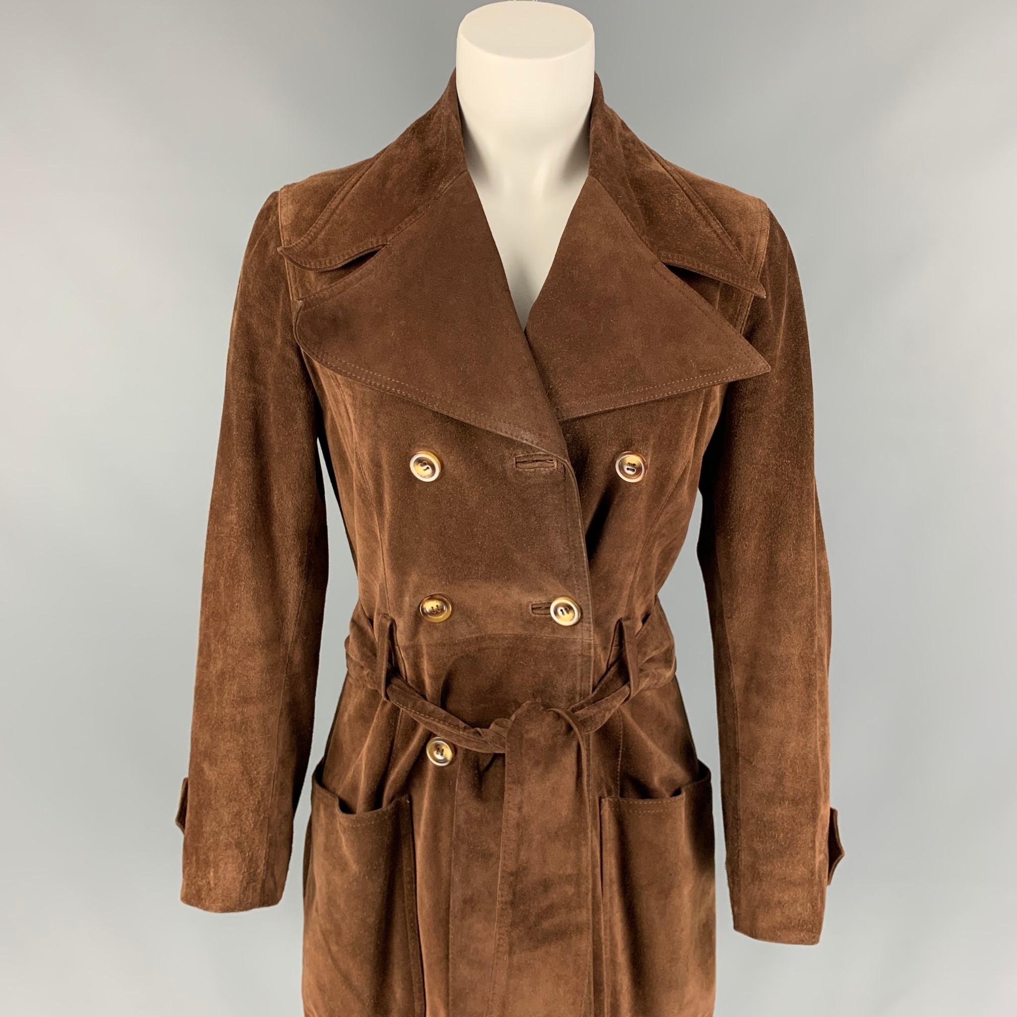 D&G by DOLCE & GABBANA trench coat comes in a brown suede with a full liner featuring a belted style, large lapel, patch pockets, and a double breasted closure. 

Good Pre-Owned Condition. Fabric tag removed.
Marked: Size tag