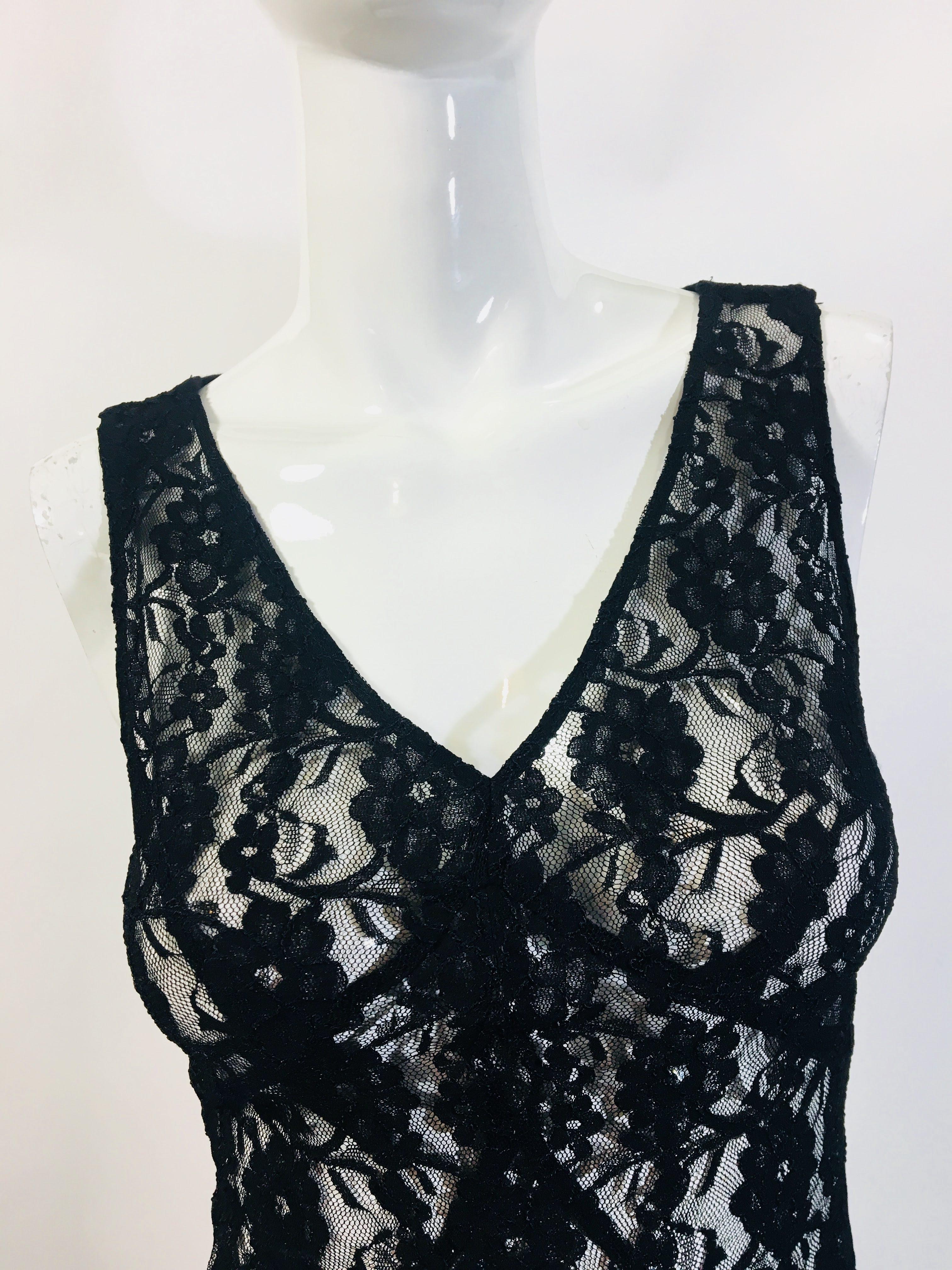 D&G by Dolce & Gabbana 
Black Sleeveless Lace Top 
V-Neck
Sheer
Front- Floral Lace
Back- Perforated Lace