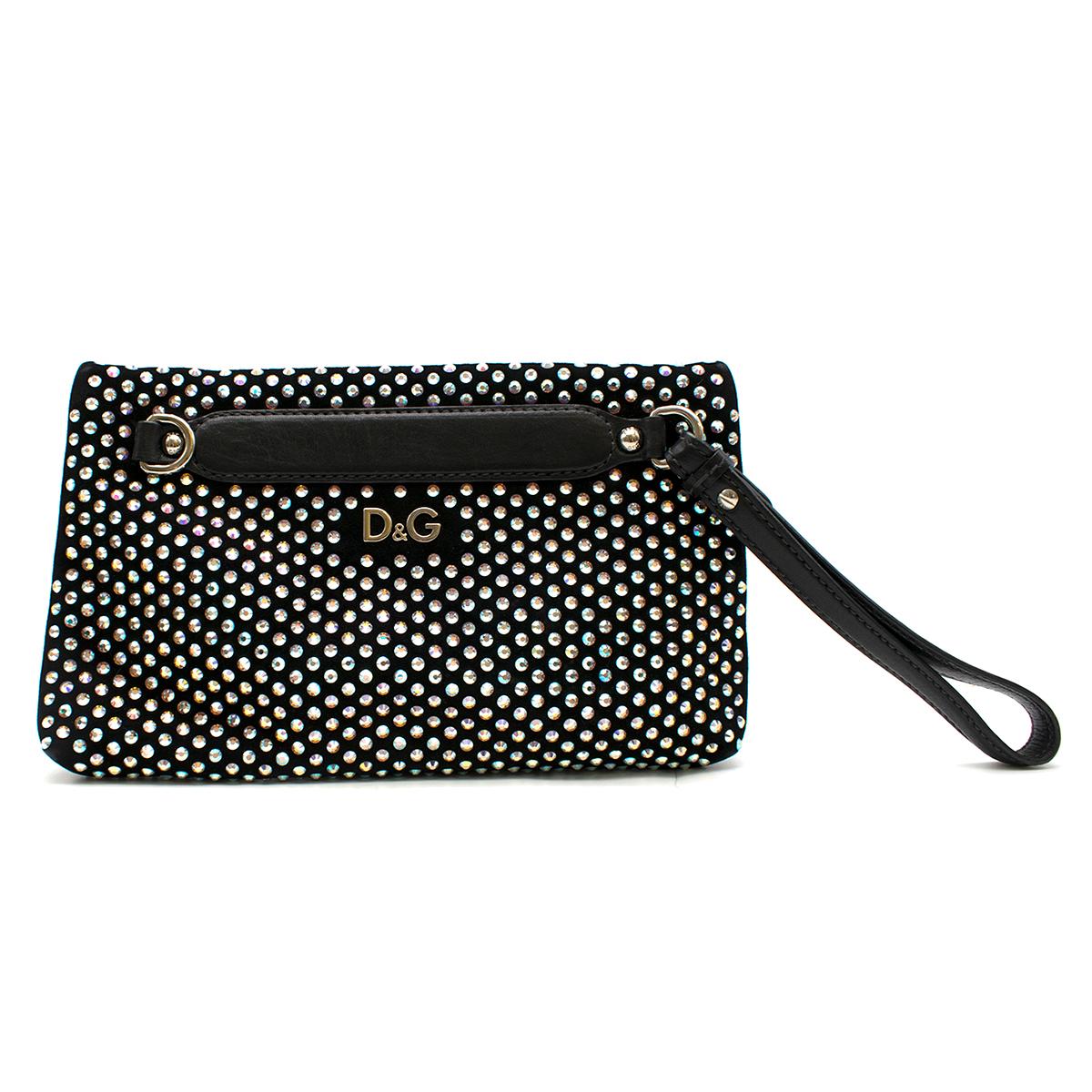 Dolce & Gabbana Crystal Embellished Black Suede Clutch 

- Black suede embellished clutch
- Holographic crystal embellishment
- Detachable silver tone metal chain strap
- Leather handle hoop
- V shape zip fastening to the front
- Two compartments
-