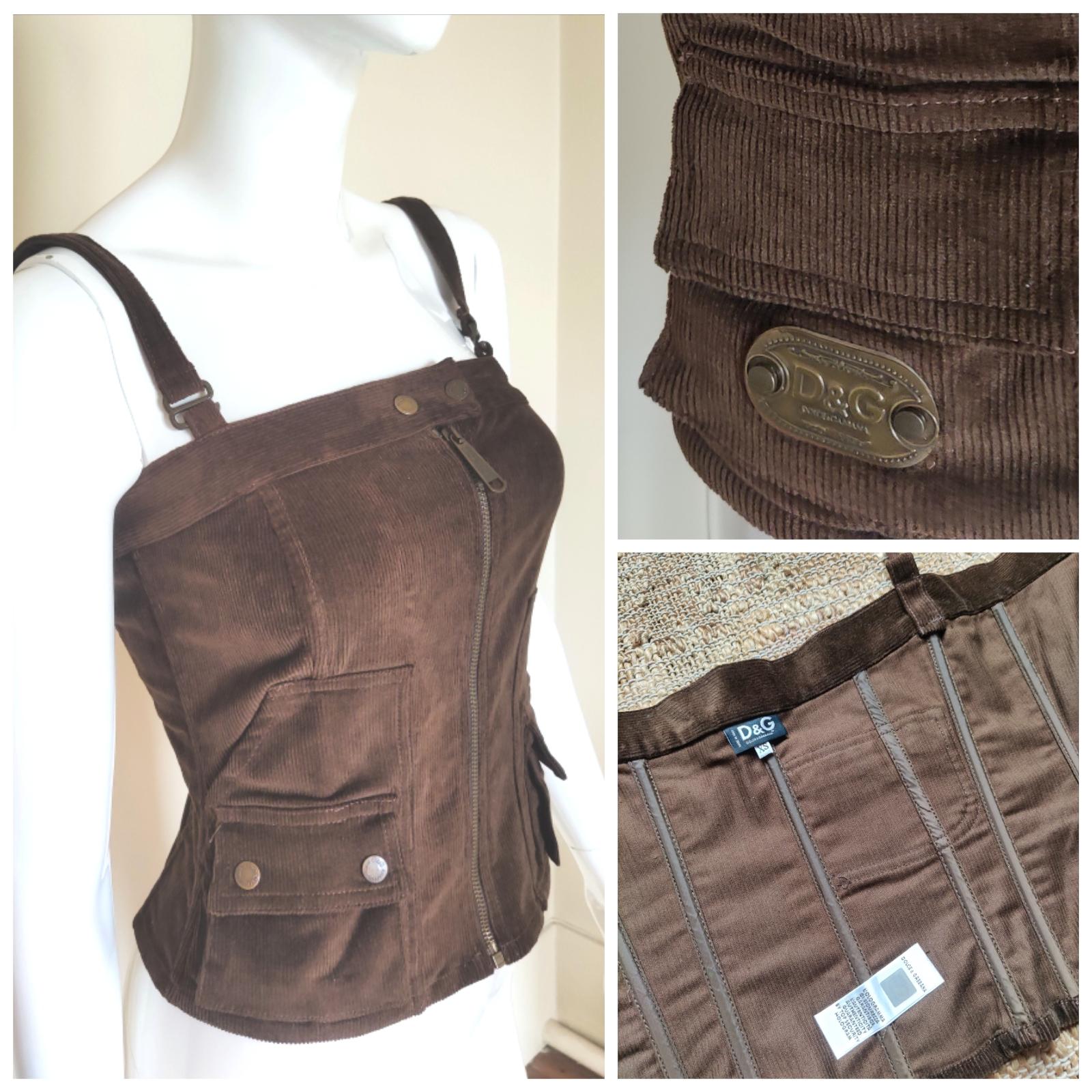 Dolce and Gabbana corset from the 90s!
Cargo style!
4 pockets on the front, 1 pocket on the back!

VERY GOOD condition!
Size: XS.
Length with straps: 48 cm / 18.9  inch
Armpit to armpit: 35 cm / 13.8 inch
Waist: 33 cm /  13 inch

Made in Italy!