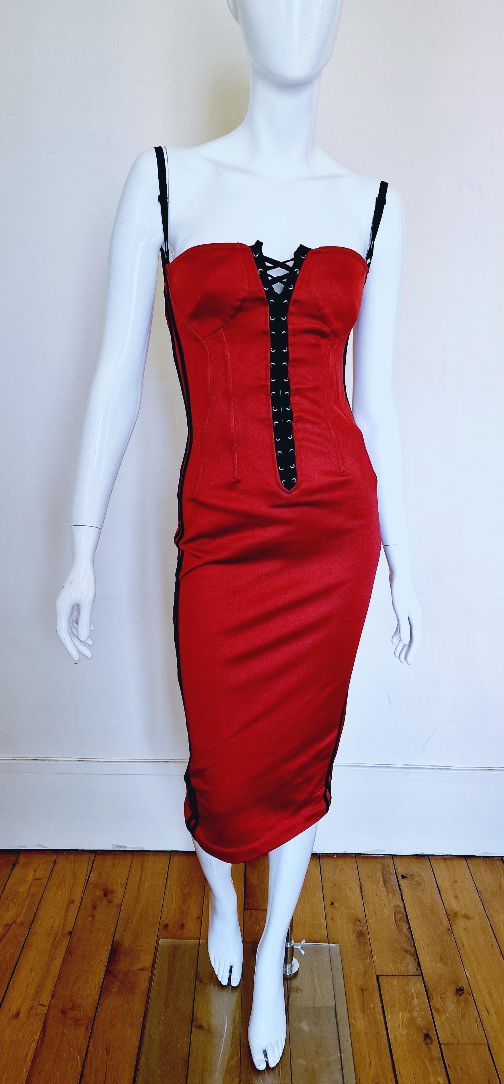Radio corset dress by Dolce and Gabbana!
Lace up on the font and the back also!
Full body lace-up corset on the back!
2 pockets. 
D&G RADIO text on a pocket!

EXCELLENT condition!

SIZE
Fits from bigger Small to Medium.
Marked size: Italian 26/40.