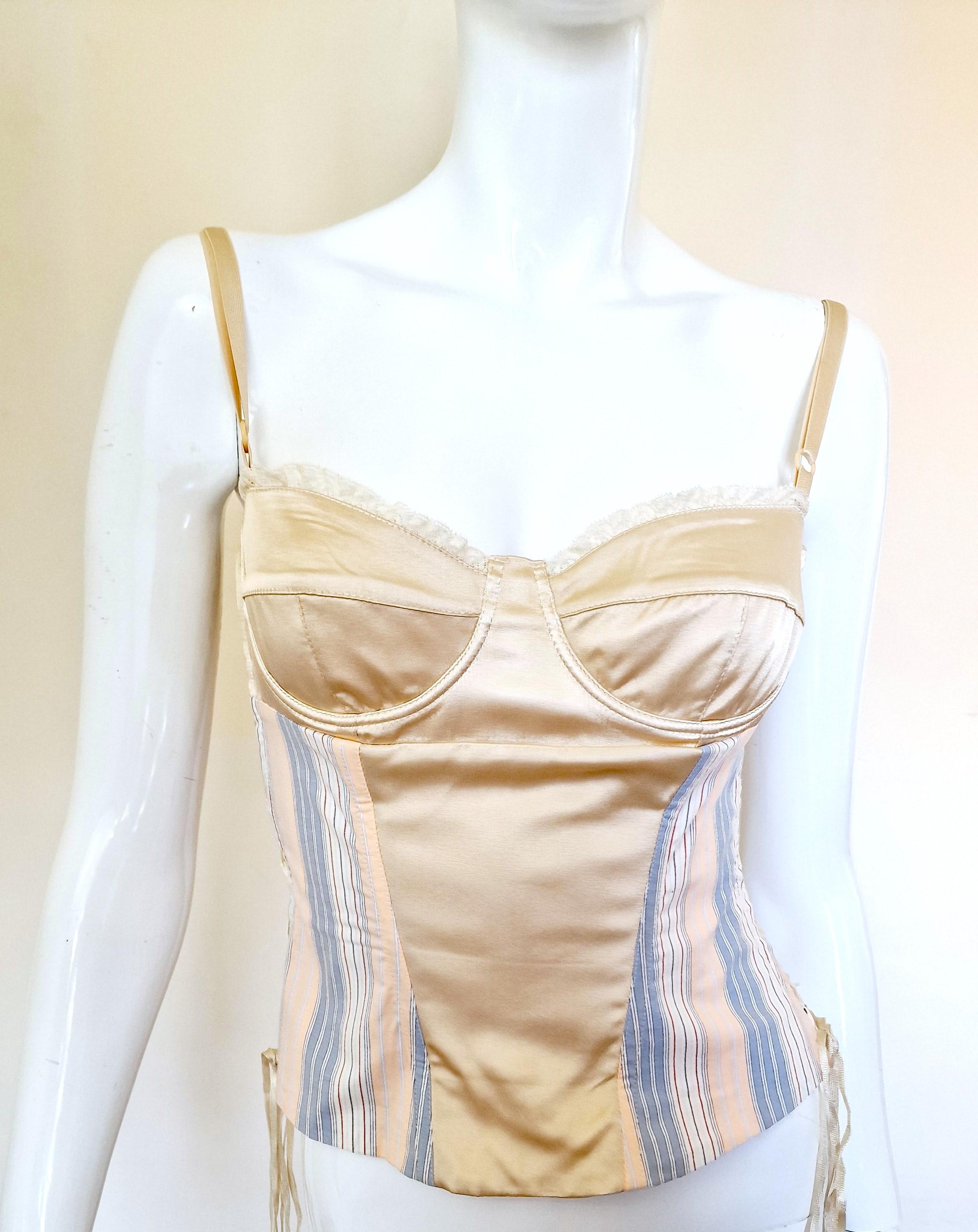 
Dolce and Gabbana corset from the 90s!

EXCELLENT condition!

SIZE
Medium.
Marked size: Italain 28/42.
Length (front): 45 cm / 17.7 inch
Length (back): 42 cm / 16.5 inch
Bust: 37 cm / 14.6 inch
Waist: 34 cm / 13.4 inch

Made in Italy!