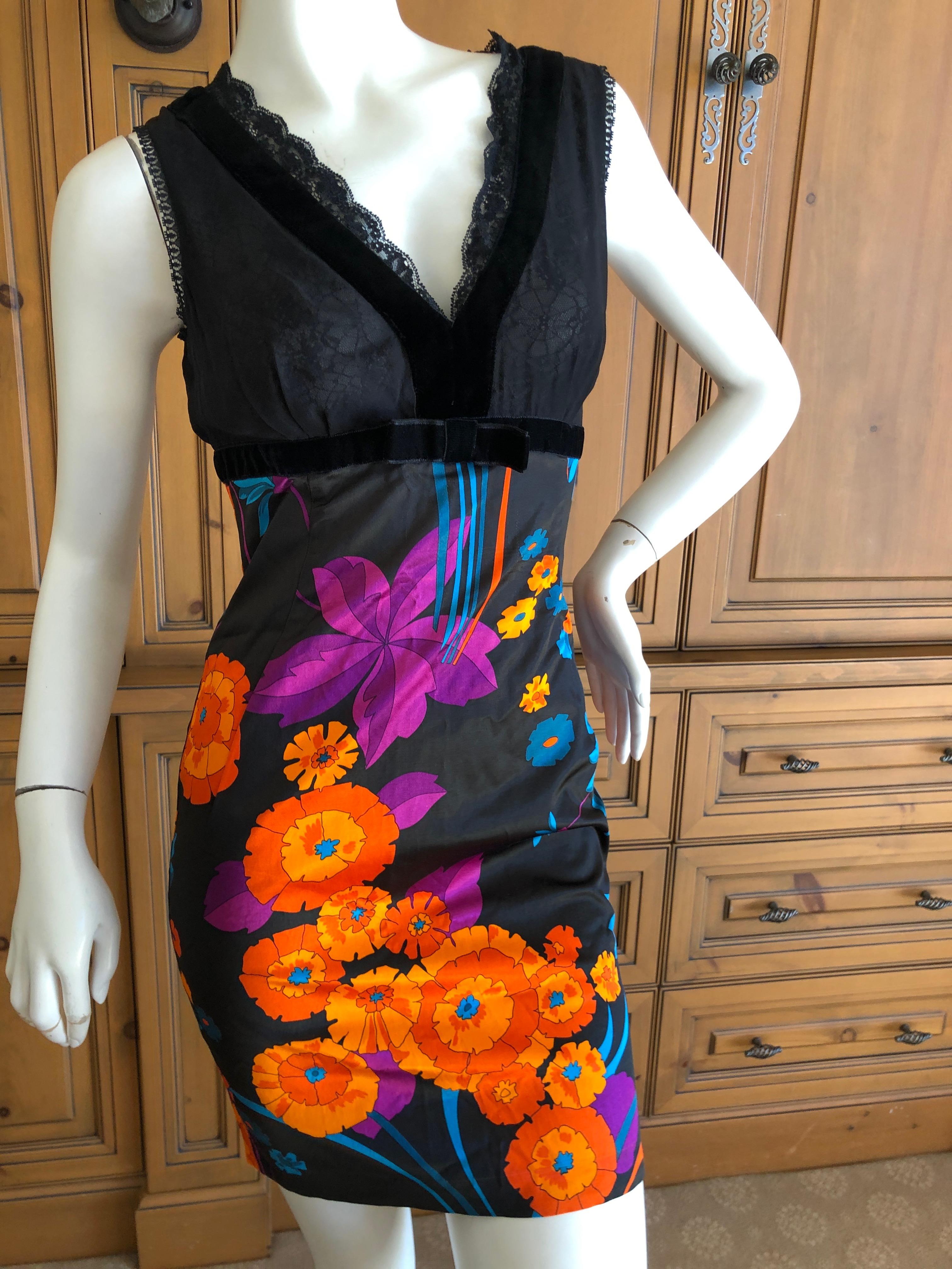 D&G Dolce & Gabbana Mod Print Cocktail Dress with Sheer Bust.
Please check measurements, Marked size 38
Bust 36'
Waist 26