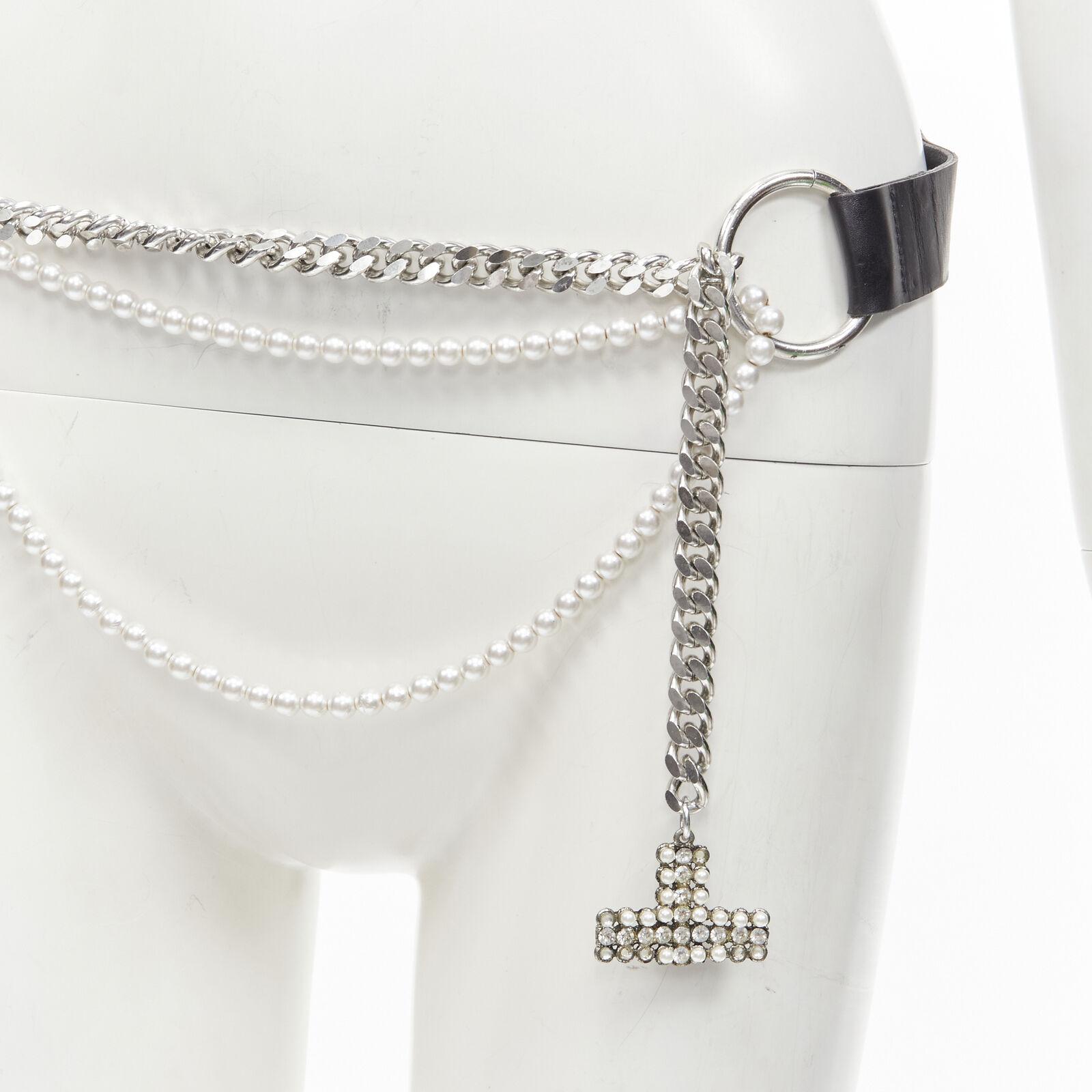 D&G DOLCE GABBANA Vintage Y2K pearl crystal embellishment chain Punk belt
Reference: ANWU/A00861
Brand: D&G
Designer: Domenico Dolce and Stefano Gabbana
Material: Leather
Color: Black
Pattern: Solid
Closure: Belt

CONDITION:
Condition: Fair, this
