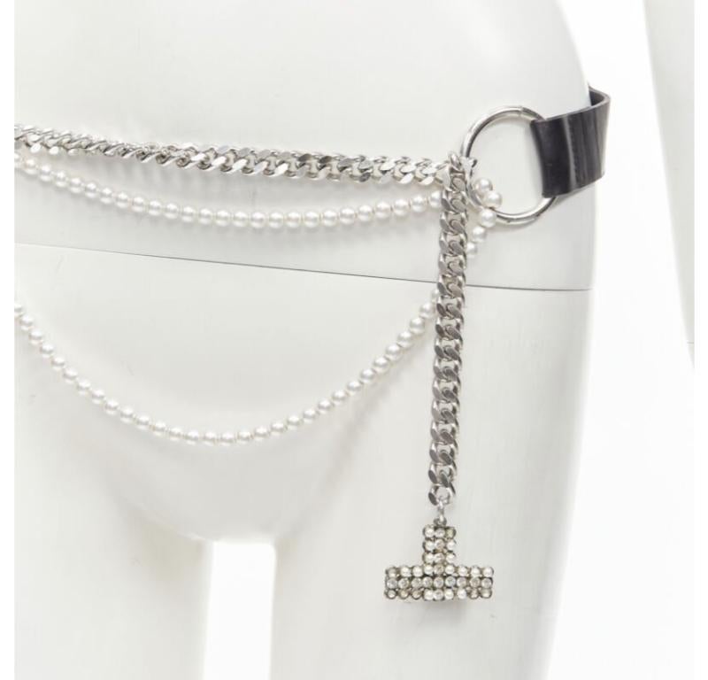 D&G DOLCE GABBANA Vintage Y2K pearl crystal embellishment chain Punk belt
Reference: ANWU/A00861
Brand: D&G
Designer: Domenico Dolce and Stefano Gabbana
Material: Leather
Color: Black
Pattern: Solid
Closure: Belt

CONDITION:
Condition: Fair, this