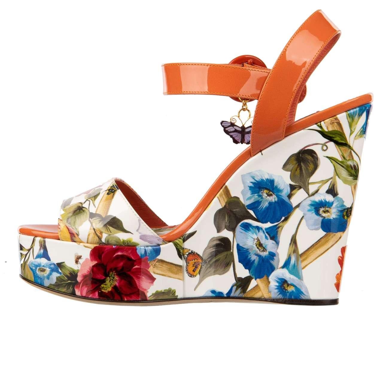 - Floral and lizard pattern printed patent leather platform sandals BIANCA with butterfly pendant in orange and white by DOLCE & GABBANA - MADE IN ITALY - RUNWAY - Dolce & Gabbana Fashion Show - Former RRP: EUR 995 - New with Box - Model: