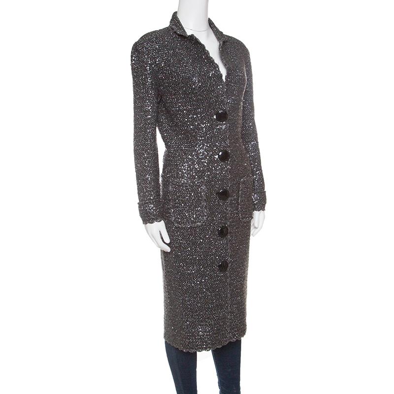 Elevate your coat obsession with this classic long coat from D&G. This grey knit creation is made of a cotton and sequined lurex blend and features long sleeves, a simple structured silhouette and front button fastenings. Pair it with denims or