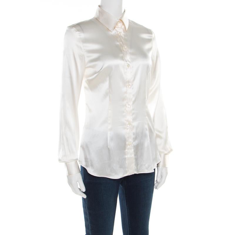 This D&G shirt can be paired with almost everything in your wardrobe. Pick this fabulous off-white piece and re-define your style. Tailored from satin, the piece has long sleeves, front buttons and a classic collar.

Includes: The Luxury Closet