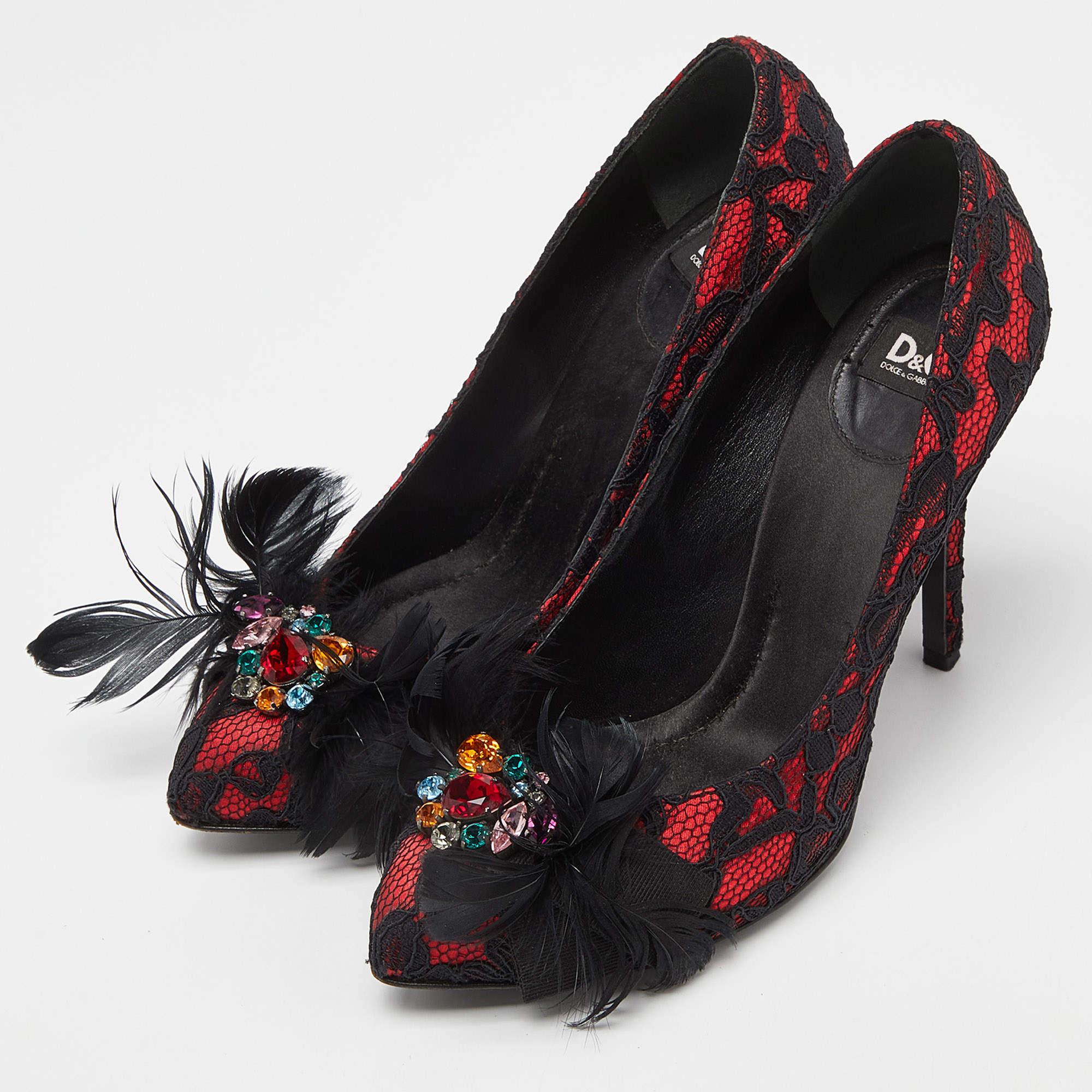 Add this exquisite pair of D&G pumps for an element of luxury. Match your outfit with these lace and satin of these pumps and complete your look. They feature feather and crystals on the uppers and are set on 11cm heels.