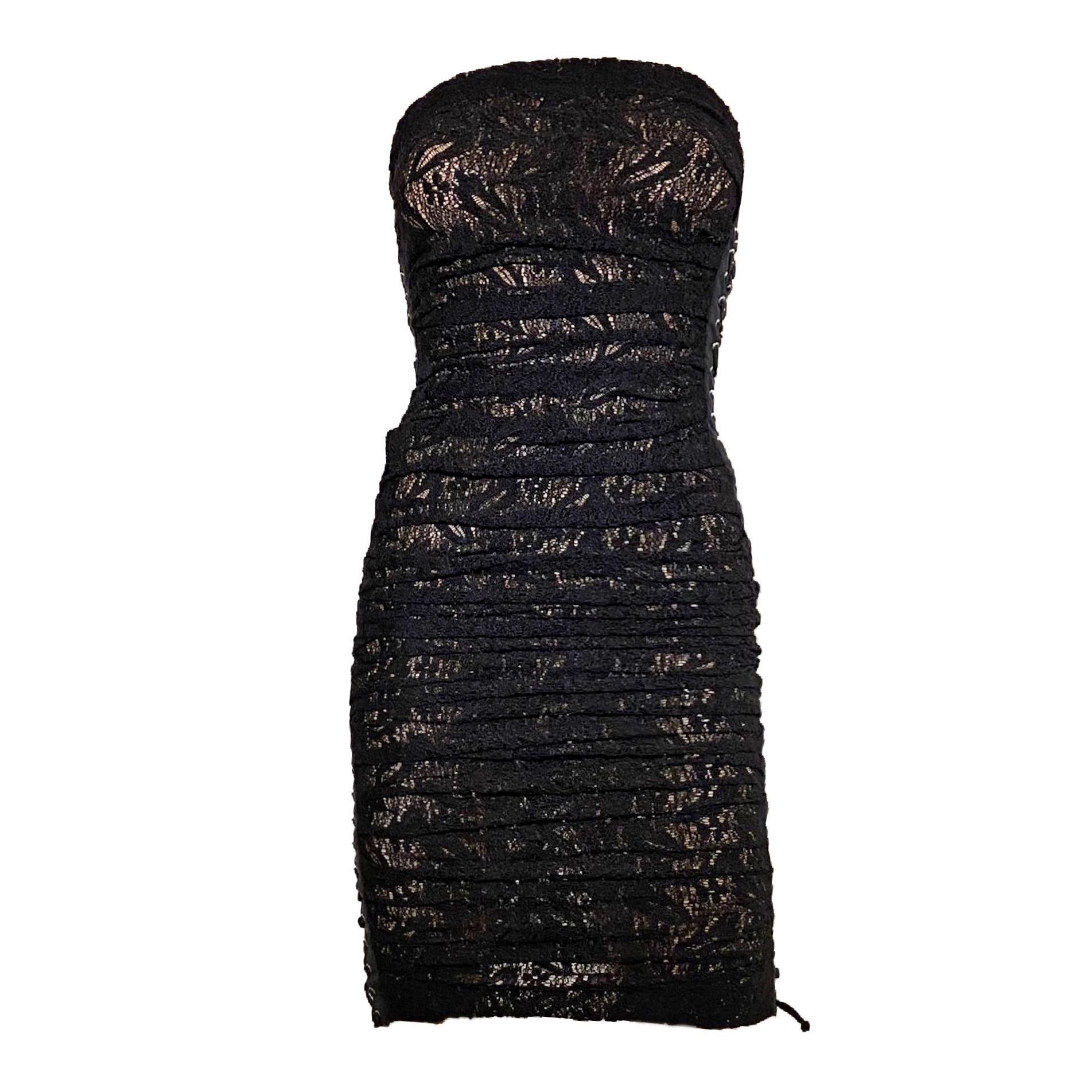 D&G by Dolce & Gabbana black lace ruched mini dress with side lace-up fastenings and back zip closure from the Spring/Summer 2007 collection. 

New with tags still attached

Size 42

Bust: 70 cm / 27.5 inch
Total length: 65 cm / 25.5 inch