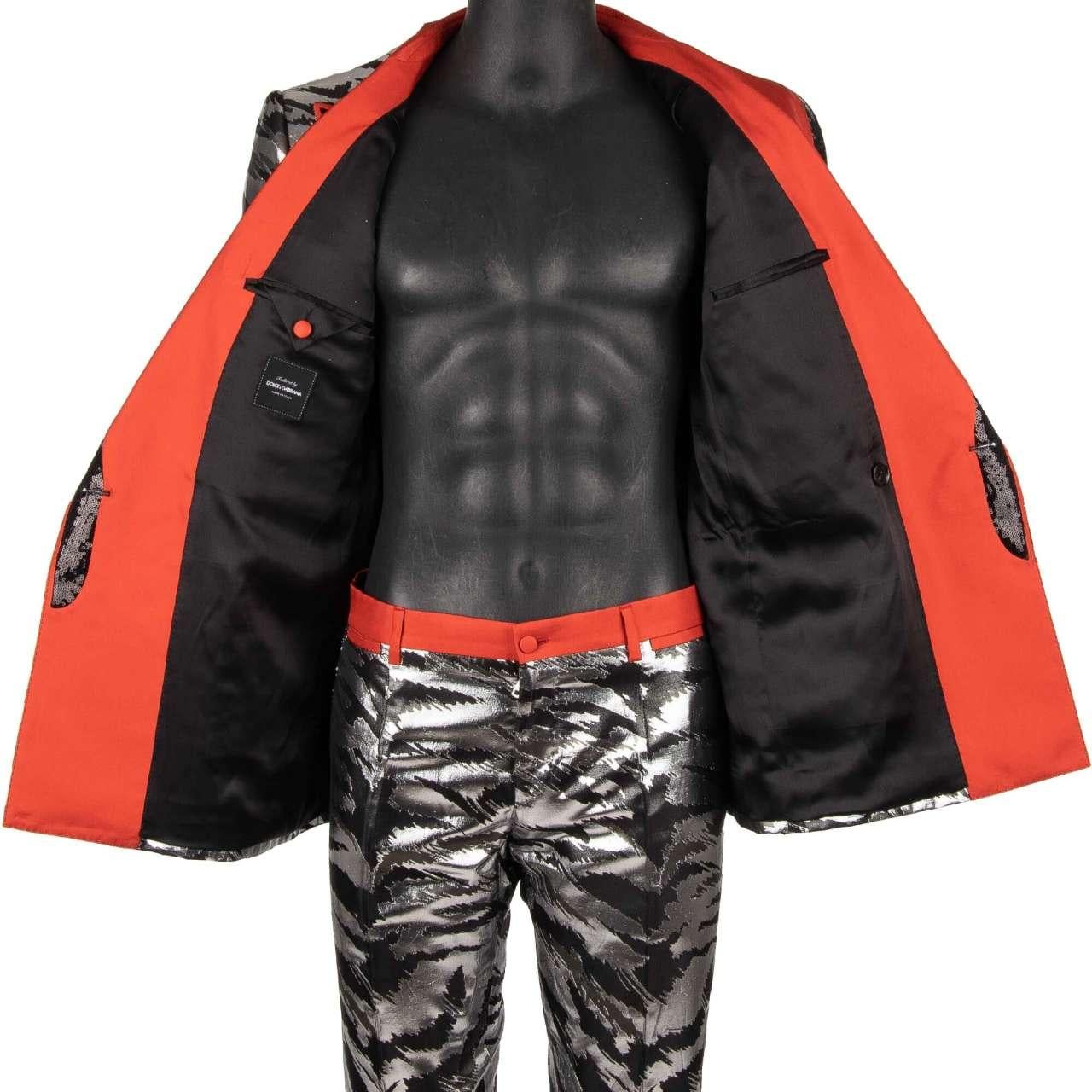 - Metallic jacquard double-breasted suit with sequins and peak lapel in silver, black and red by DOLCE & GABBANA - RUNWAY - Dolce & Gabbana Fashion Show - New with tag - MADE in ITALY - Slim Fit - Model: IK7CMZ-HJMBU-HIIIN - Material: 45% Polyester,