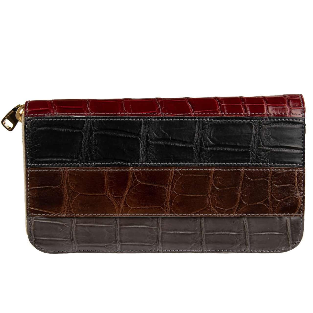 - Striped Crocodile Leather Patchwork Zip-Around wallet with logo plate in black, gray, brown and red by DOLCE & GABBANA - New with Tag and Authenticity Card - MADE IN ITALY - Former RRP: EUR 2.350 - Model: BI0473-B213R-80995 - Material: 100%