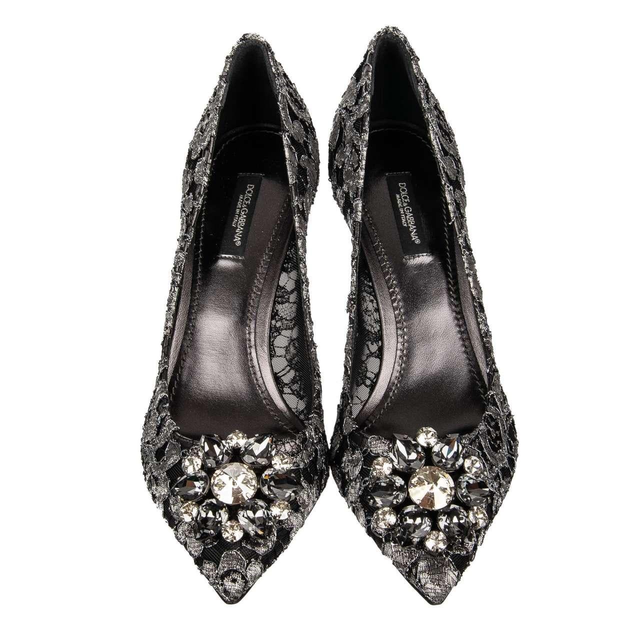 - Taormina lace pointed Pumps BELLUCCI with crystals brooch in silver and black by DOLCE & GABBANA - New with Box - MADE IN ITALY - Former RRP: EUR 695 - Crystals brooch in front - Model: CD0066-AE637-87505 - Material: 52% Rayon, 38% Lambskin, 10%