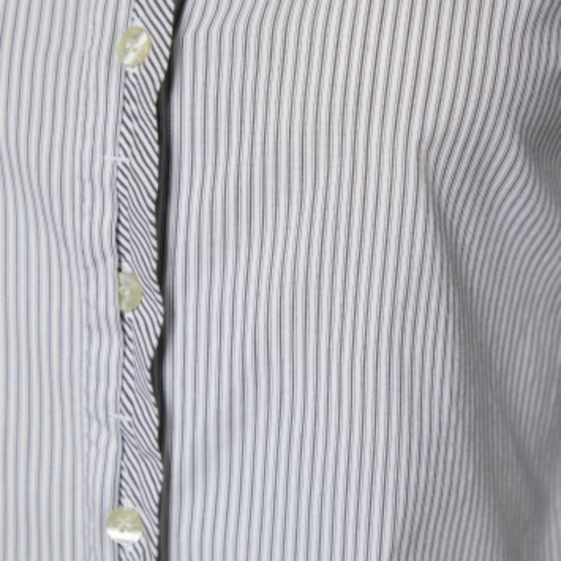 Finely tailored from quality material, this shirt will make you look smart and classy. It will lend you a desirable fit and is enriched with luxurious elements.