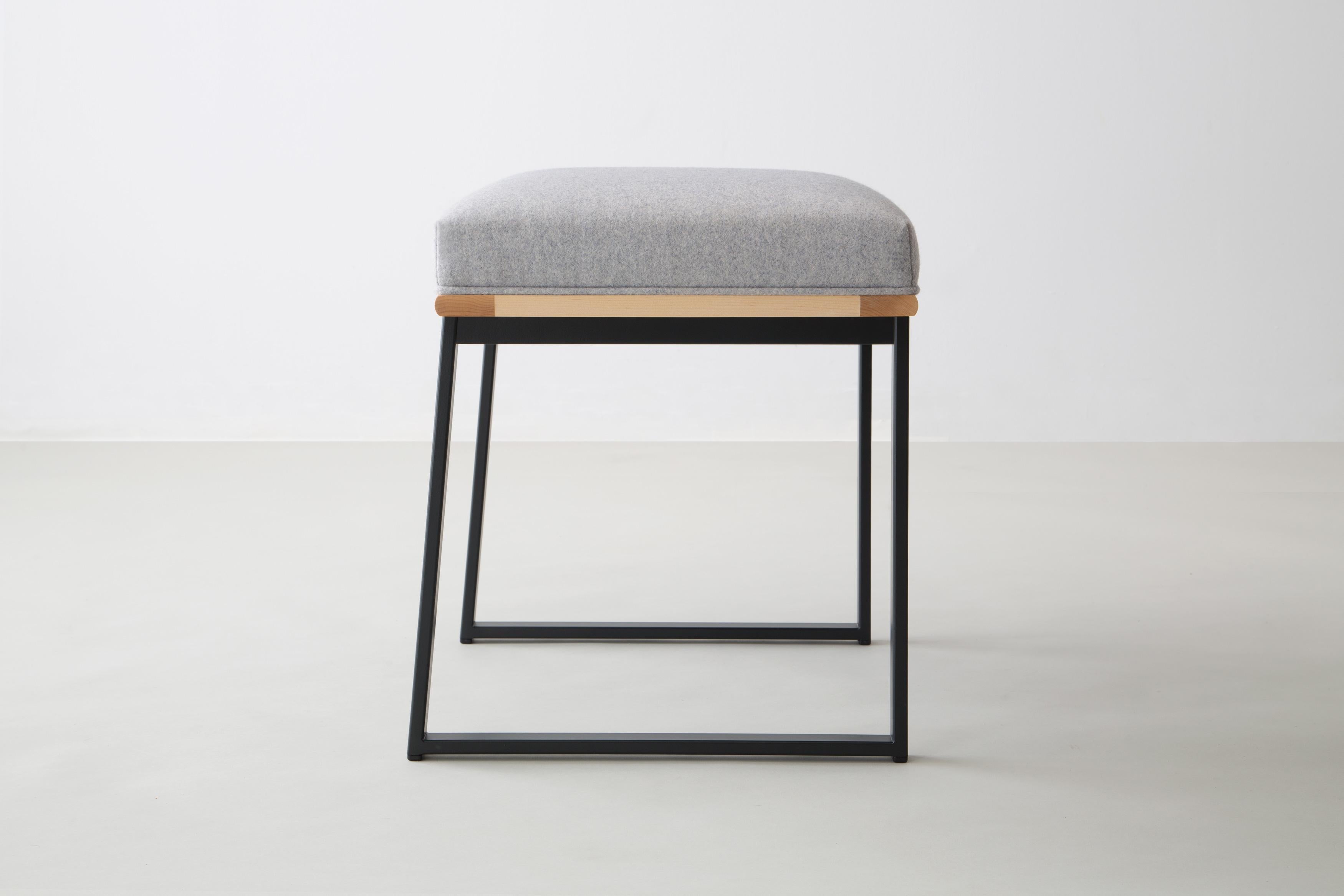The DGD Dining Stool finds formality and comfort in the industrial and organic.

Powder coated steel frame shown in black and available in any standard RAL colors.

Shown in maple with Divina MD wool felt by Kvadrat.

Available with:

Wood in ash,