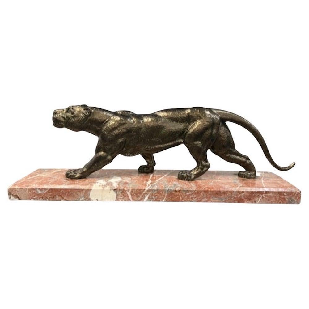 "PANTHER" Sculpture covered in a cold patina. c.1930                                                      
 Rests on marble base. Inscribed in script: D. H. Chiparus.

Cold patina was very popular in the Art Deco period. The metal: bronze, spelter,