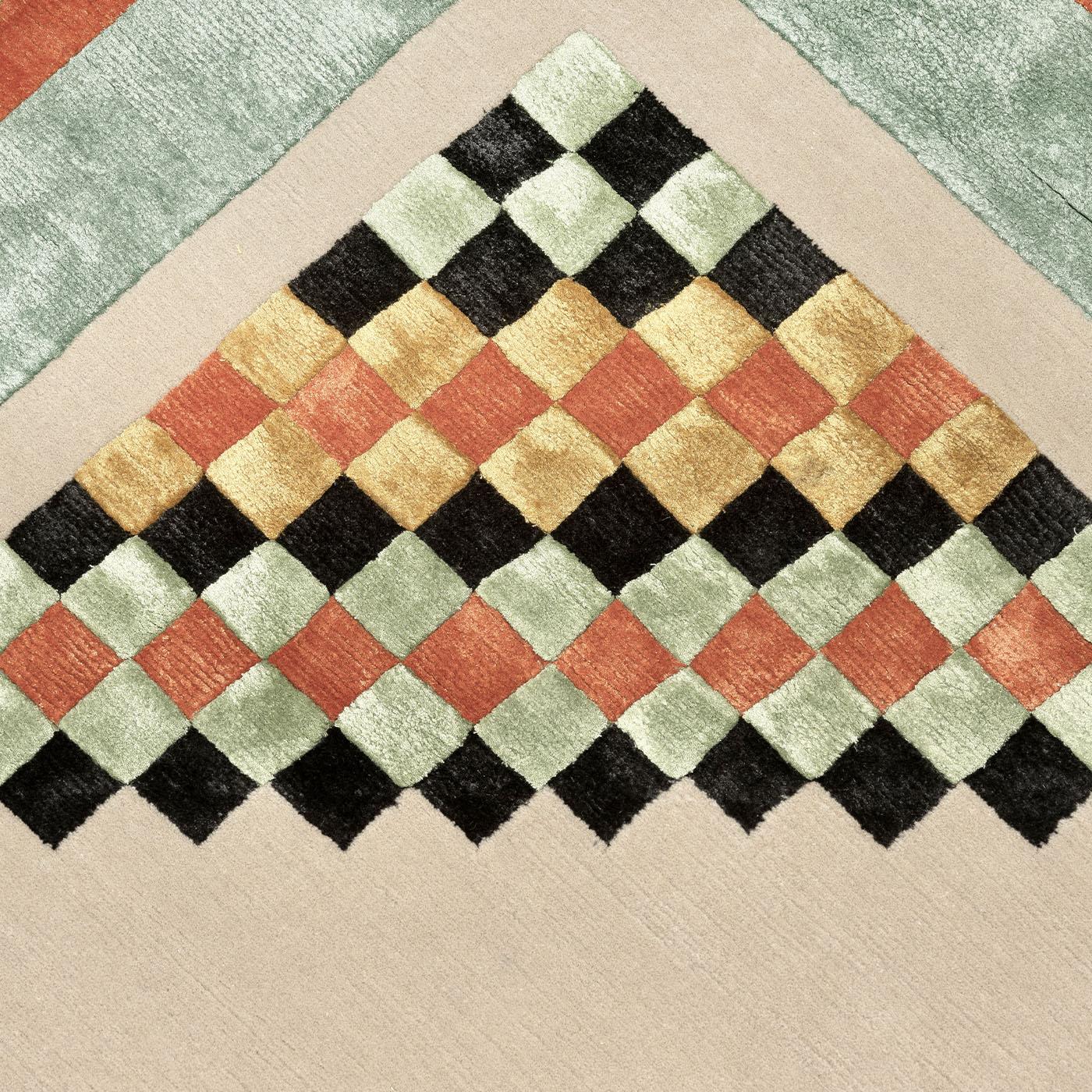 Dharma, an authentic 1940s Indian Deco rug, inspired this Milanese reproduction. It captures the warm, earthy colors and skillfully arranges them in a classic kilim pattern, creating an effortlessly versatile rug suitable for both classic and modern