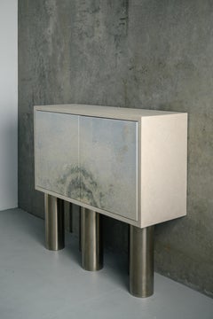 Cabinet DI - in pietra, gesso e acciaio inox