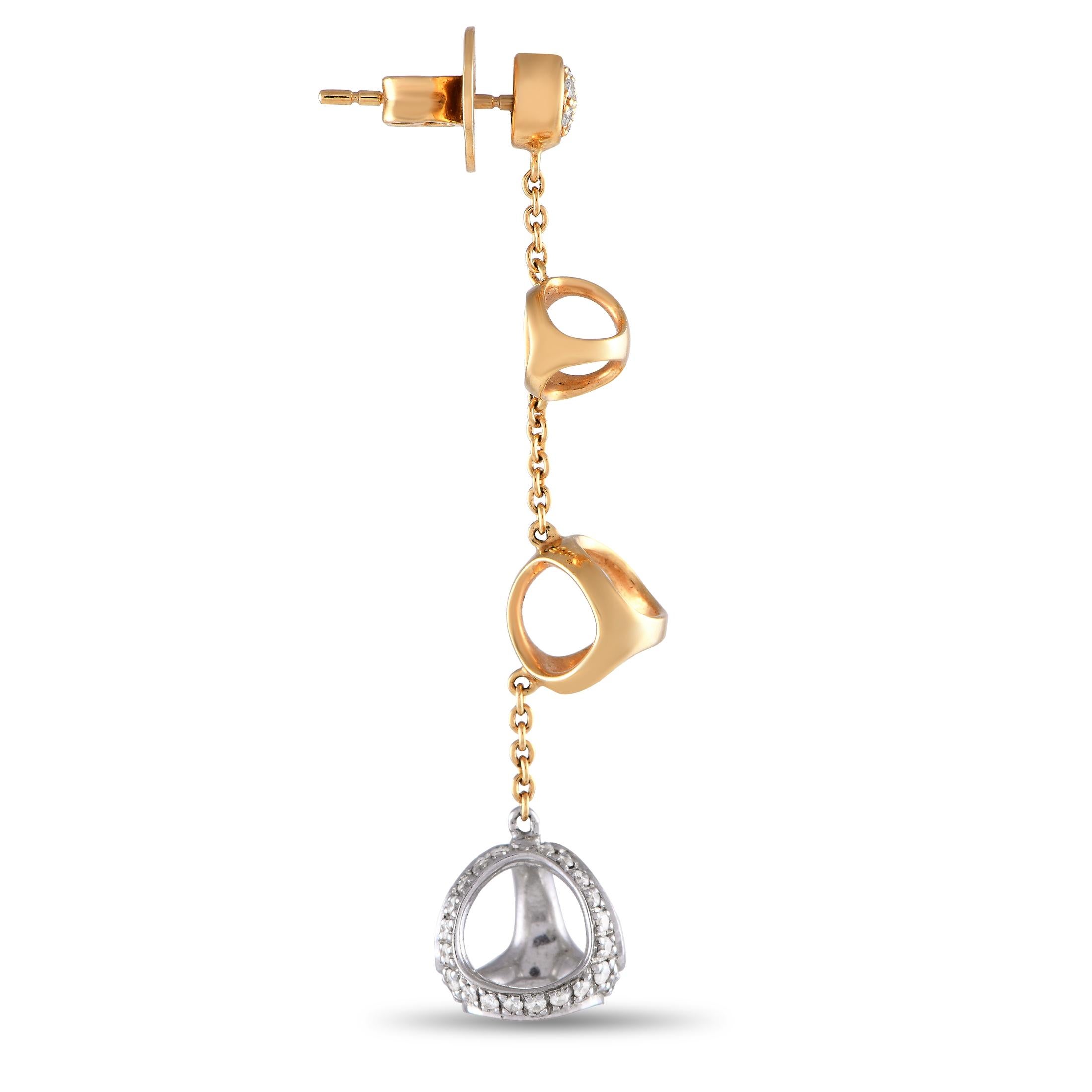 From Italian luxury jewelry brand Di MODOLO, here is a pair of dangling earrings that are timeless and modern at once. These dazzling danglers feature a round post with a cluster of diamonds at the center and a push-back closure. Dangling from each