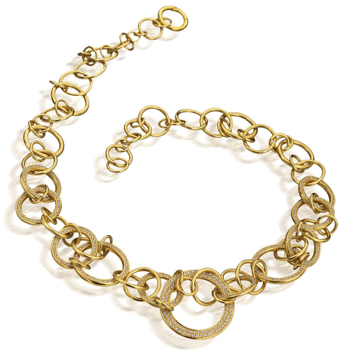 A fabulous Di Modolo diamond necklace featuring intertwined 18k yellow gold circles set with round brilliant cut diamonds. The necklace measures 17