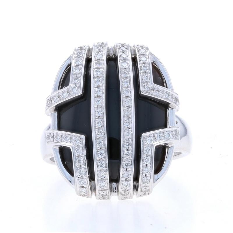 Size: 8
Sizing Fee: Up 3 sizes for $60 or Down 2 sizes for $40

Brand: Di Modolo
Collection: Favola

Metal Content: 18k White Gold

Stone Information

Natural Onyx
Color: Black

Natural Diamonds
Carat(s): .72ctw
Cut: Round Brilliant
Color: F -