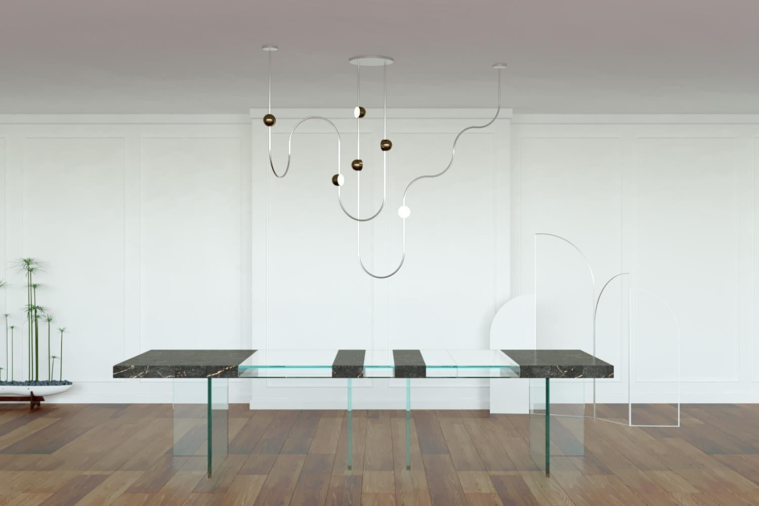 Dia is a sculptural chandelier inspired by the heterophony of natural sound. Each frame (or melody) is hand-rolled with all joints cleverly concealed within the circular light source, the playful LED light sources disperse ambient light in all