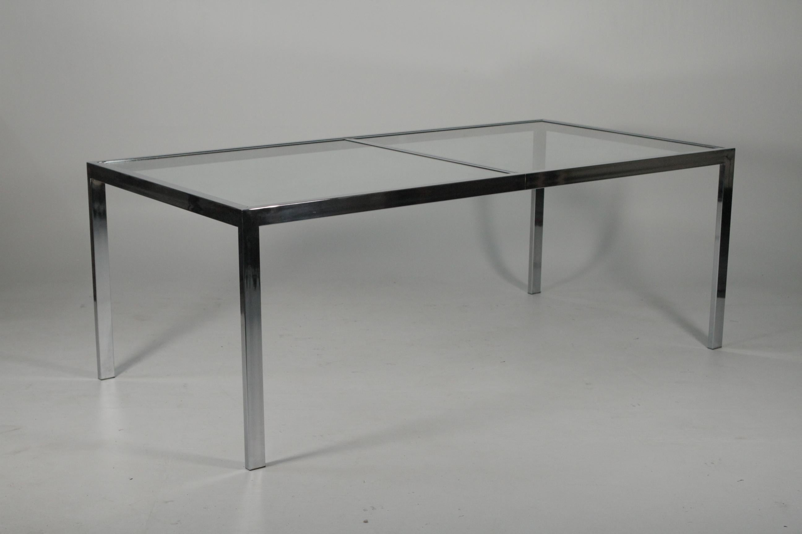 DIA Mid-Century Modern chrome and glass top dining room table.
Dimensions 38