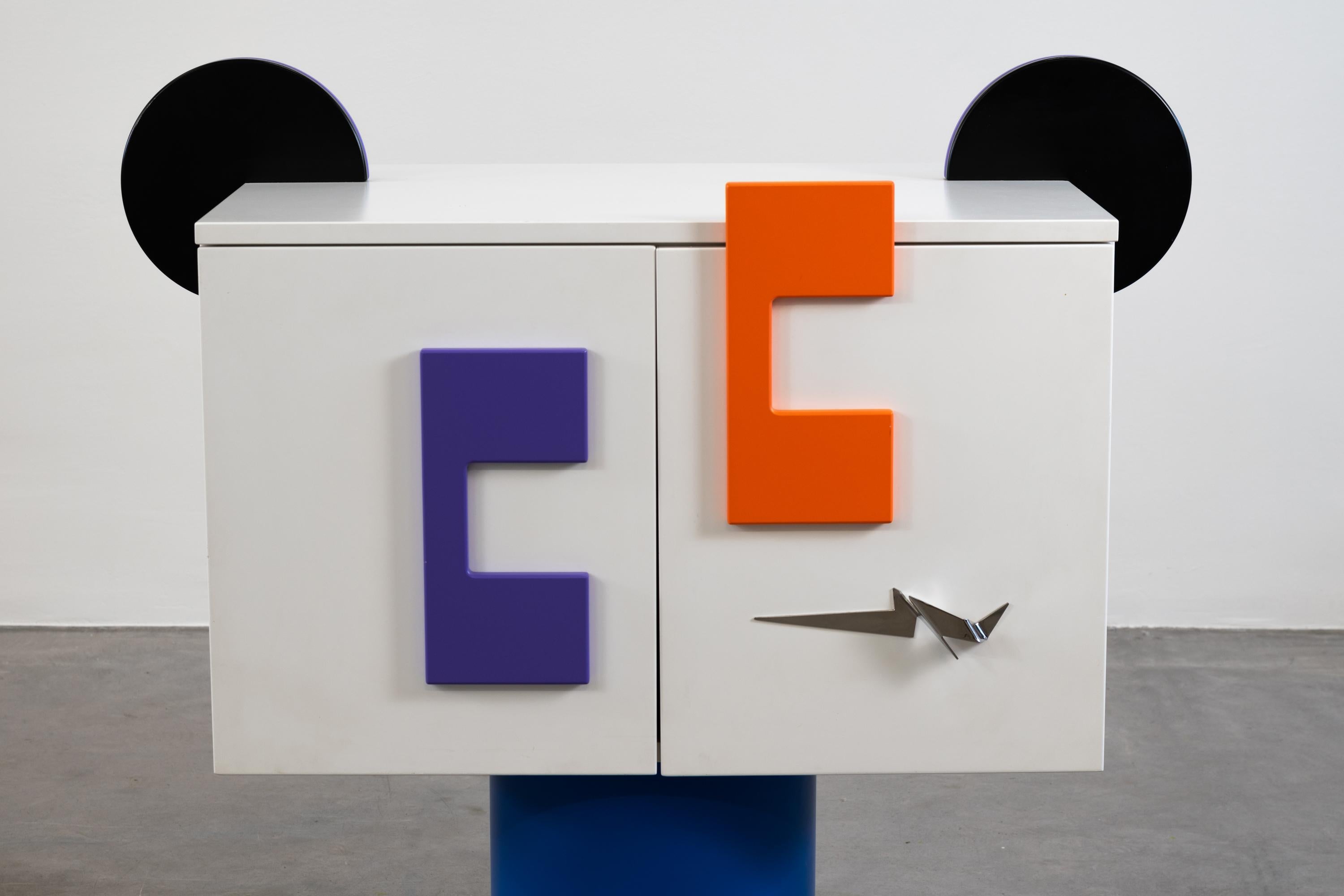'Diadainconsupertrafra' storage cabinet by Alessandro Mendini (1931-2019)
Polychrome lacquers on wood, metal and PVC 
Manufactured by Zerodisegno , Italy, 2007
 Measures : Width 104 x Depth 54 x Height 102 cm.