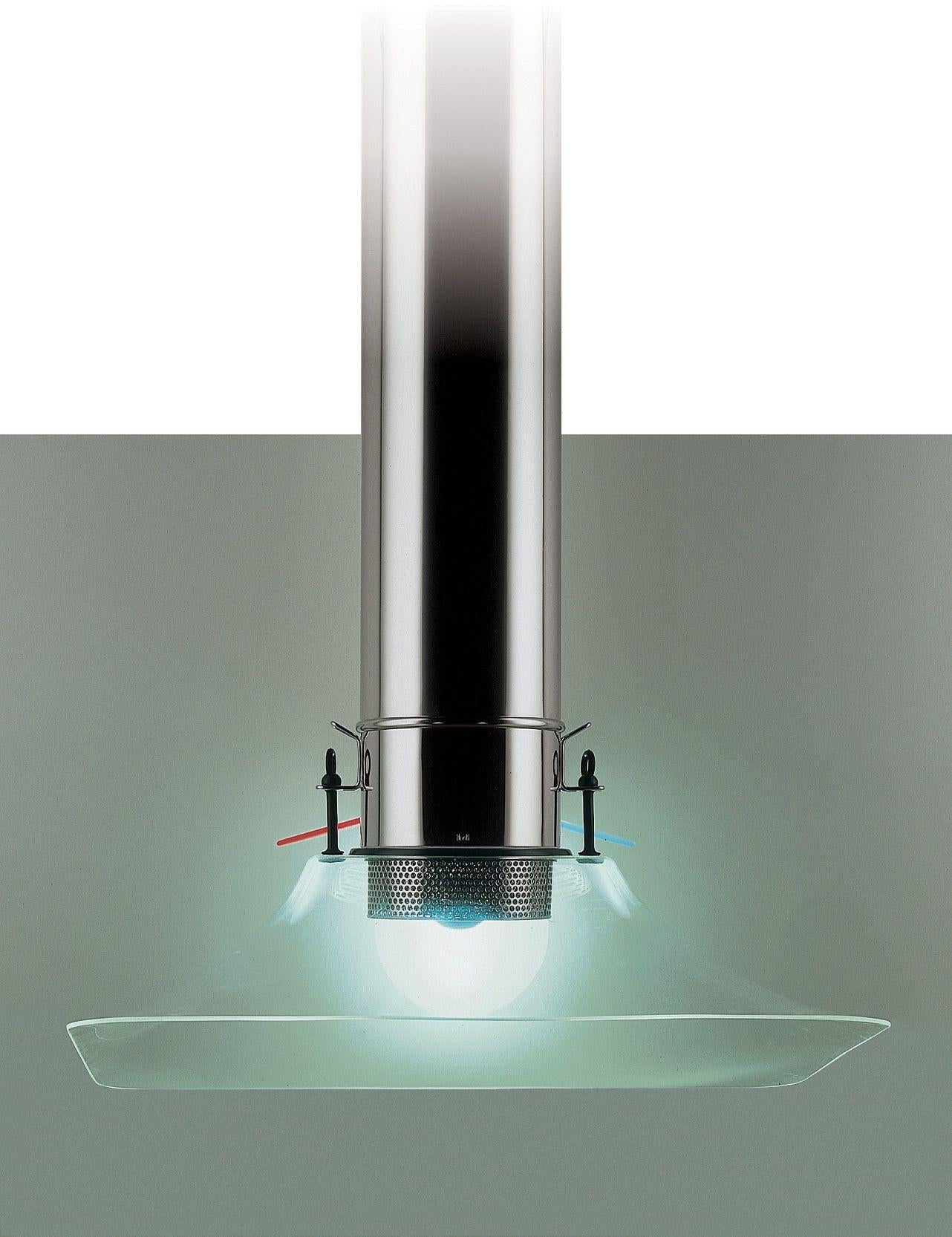 Diafana kitchen hood by Lluis Clotet & Oscar Tusquets 
Dimensions: D 50 x W 90 x H 60 cm 
Materials: Motor housing, exit pipes, elbows, reduces, and grease collector tray in polished stainless steel. Flexible pipes and filters in aluminum. Cast