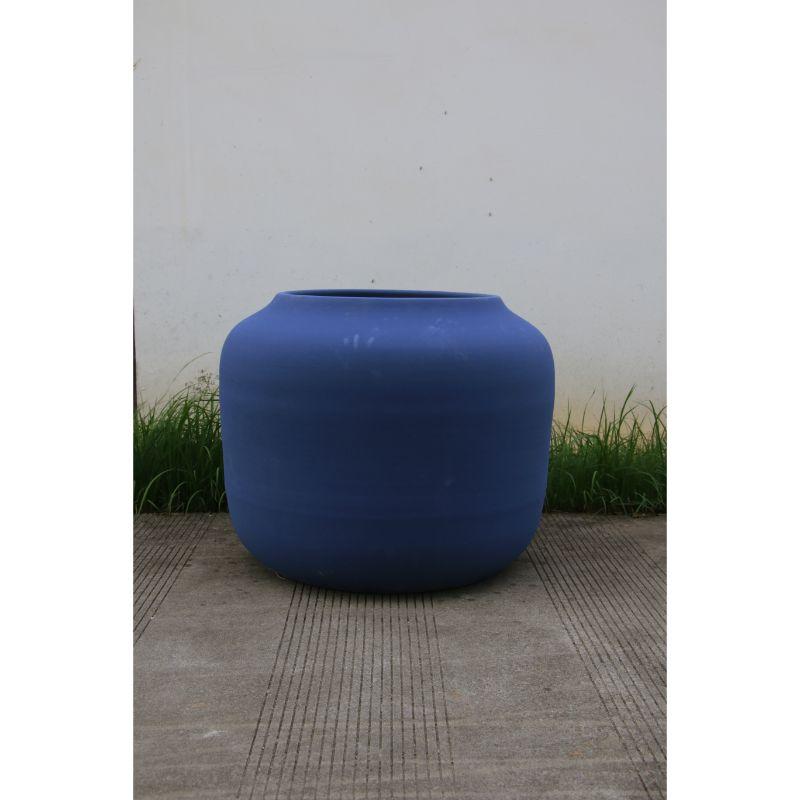 Dialogue small planter with matte blue glaze by WL Cermics
Design: Lex Pott
Materials: Porcelain, matte blue glaze
Dimensions: H97 x Ø82 cm
Also available: 
Sizes: Medium and Large.
Colors: Yellow, dark green, soft green, orange, soft pink and