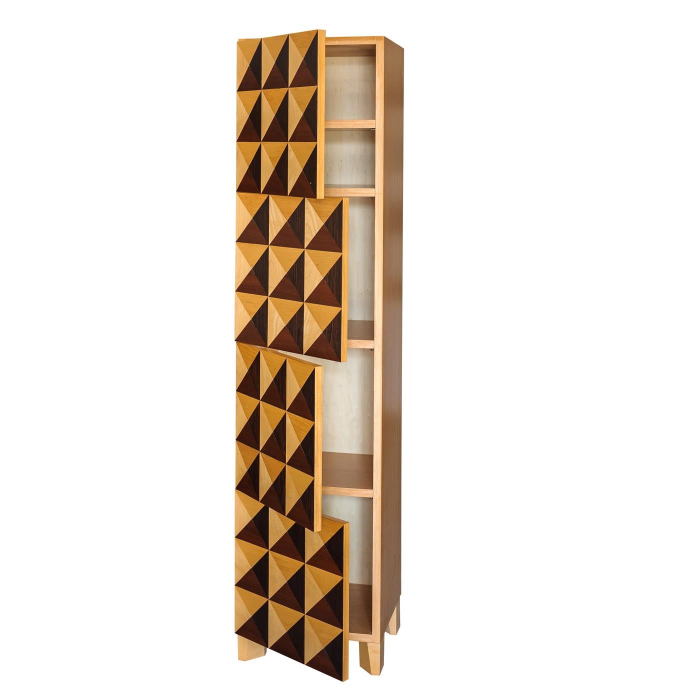 A stunning exemplar of modern furniture, this superb cabinet blurs the lines between abstraction and cabinetmaking to create an architectural work of art. Fashioned entirely of anigre wood, the rectangular structure's front panel is composed of a