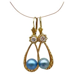 Diamant drop earrings with a blue pearl in 14k gold