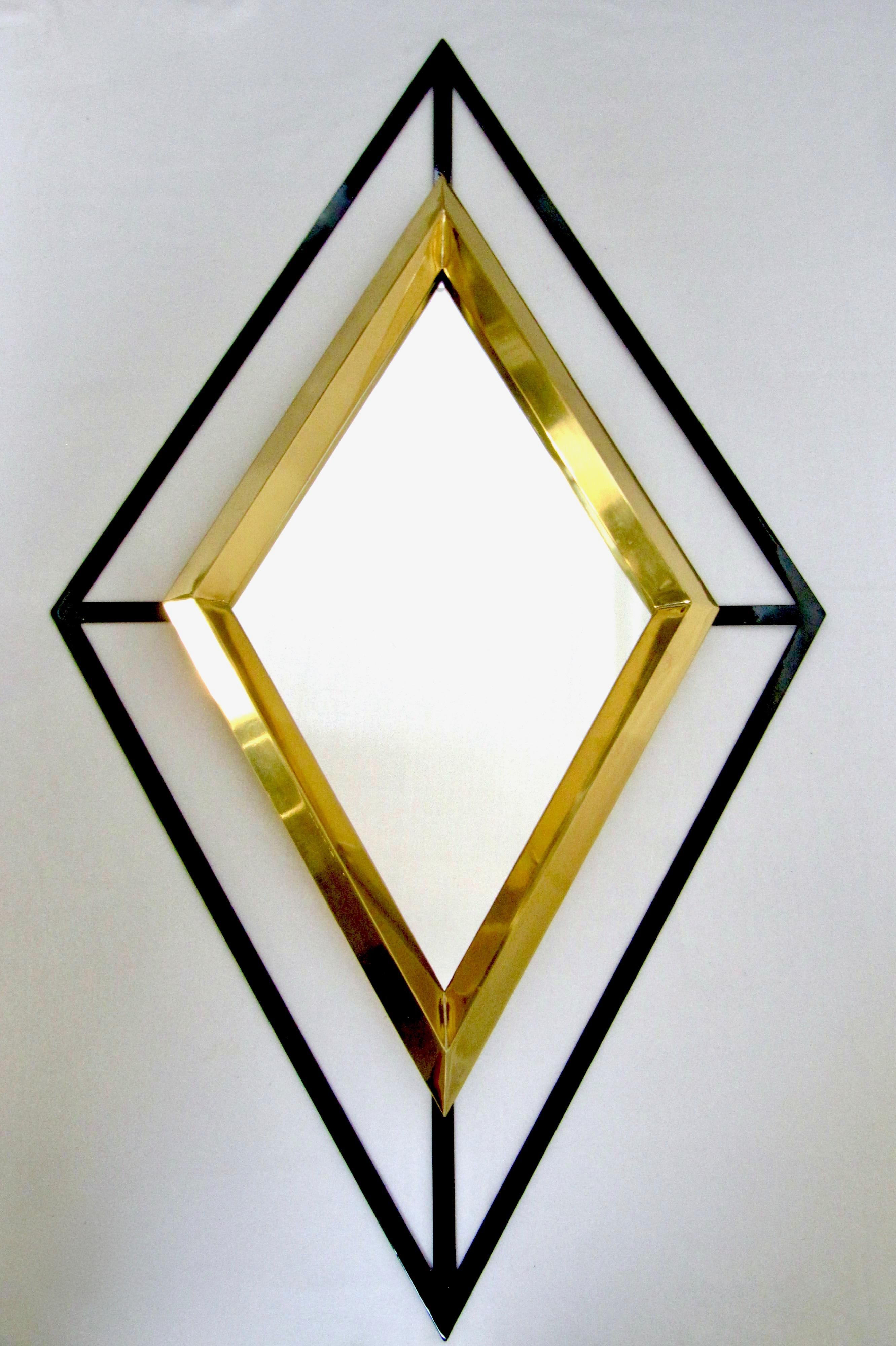 Diamante mirror by Nicola Falcone

Statement mirror. 

The shape of a luxurious diamond in Brushed brass and an iron structure painted in black or red. 

Handmade in Italy.