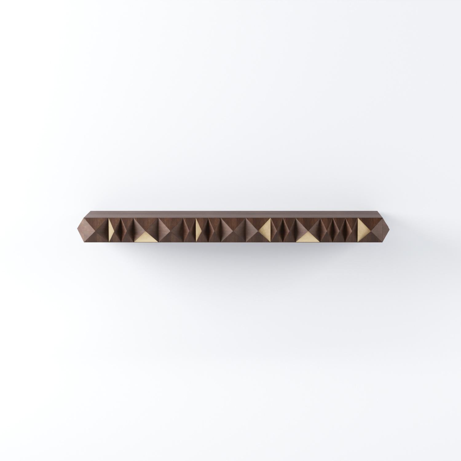 Inspired by the brilliance and geometry of cut gemstones, the Diamante Sideboard by Bruno de Carvalho is a masterful blend of sculptural form and artisanal technique. Its faceted surface creates a striking rhythm of light and shadow, with