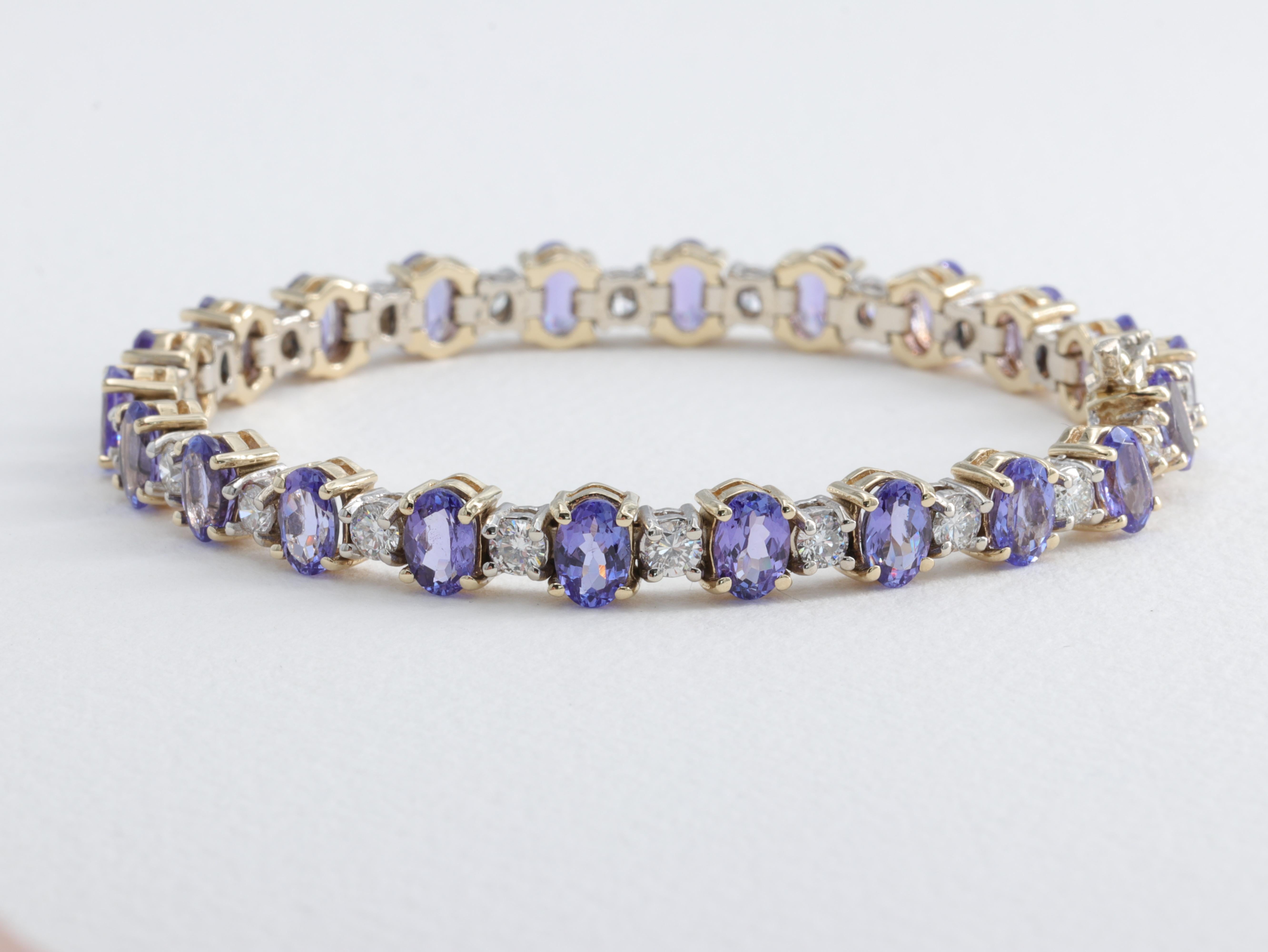 Oval Cut Tanzanite & Diamond Tennis Bracelet in Two Tone Yellow and White Gold  For Sale