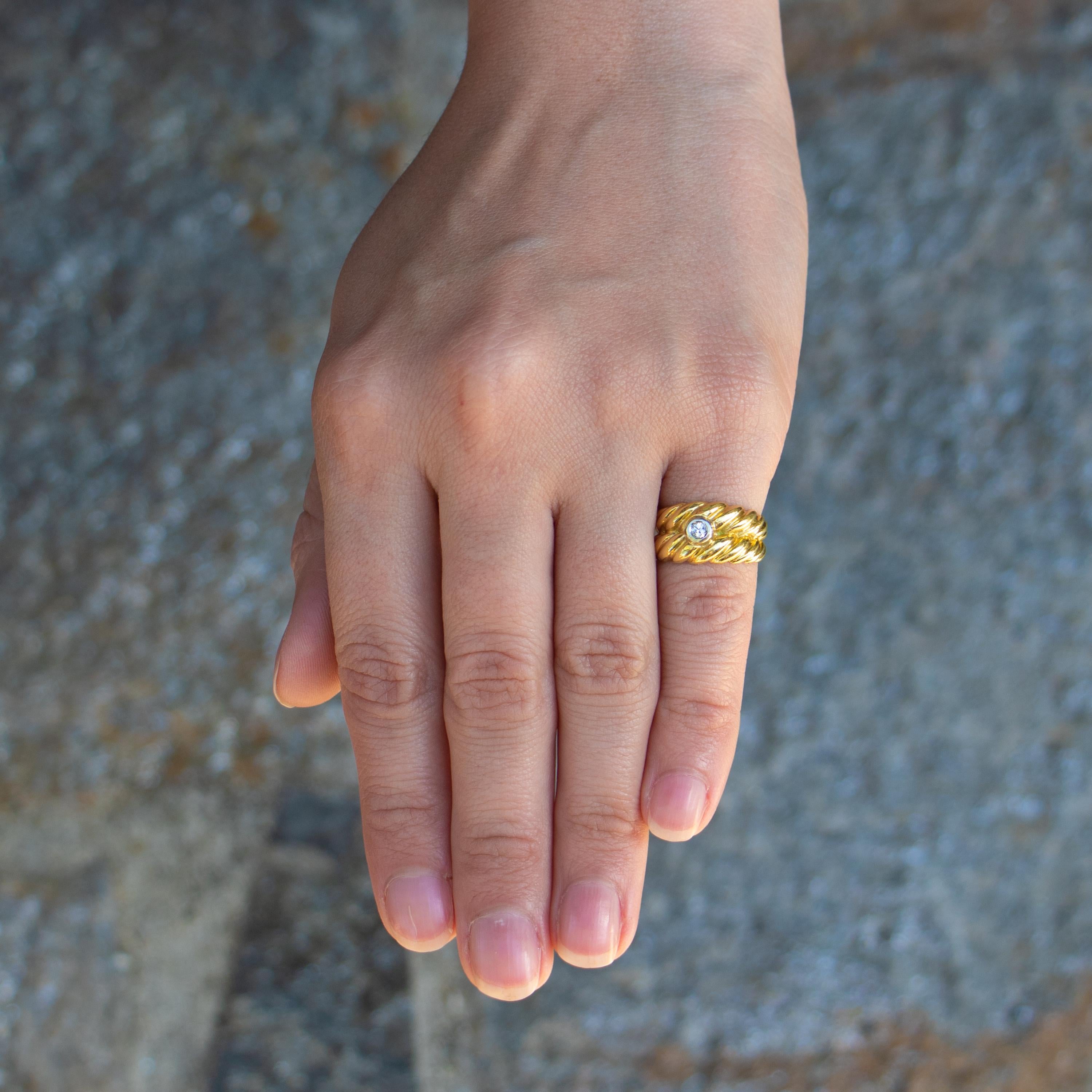 Beautiful 18K Gold ring with a small diamond on the front. Adds that subtle little bit of shine to any outfit. 
Diamond = 0.05 carats
18K Yellow Gold
Ring Size = 4
Complimentary Ring Sizing Available
7.2 Grams
Jewelry Gift Box Included