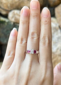 Diamond 0.56 and Ruby Ring set in Platinum 950 Settings