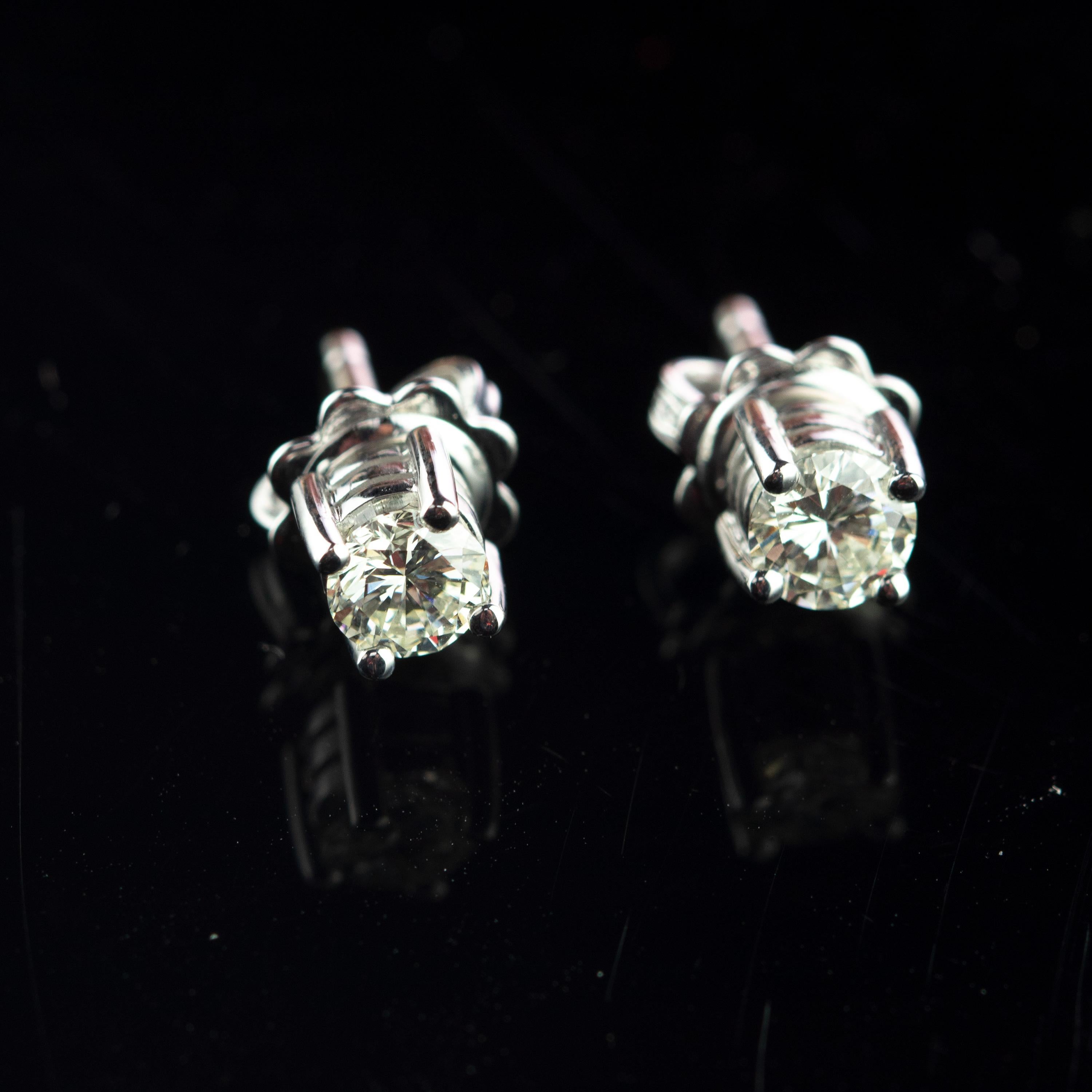 Impressive engagement and bridal Griffe Earrings. Top quality 0.67 carat diamond gems. Embellished by an 18 karat white gold setting. This epic statement jewel shapes a breathtaking handmade design. Is an outstanding display of Italian