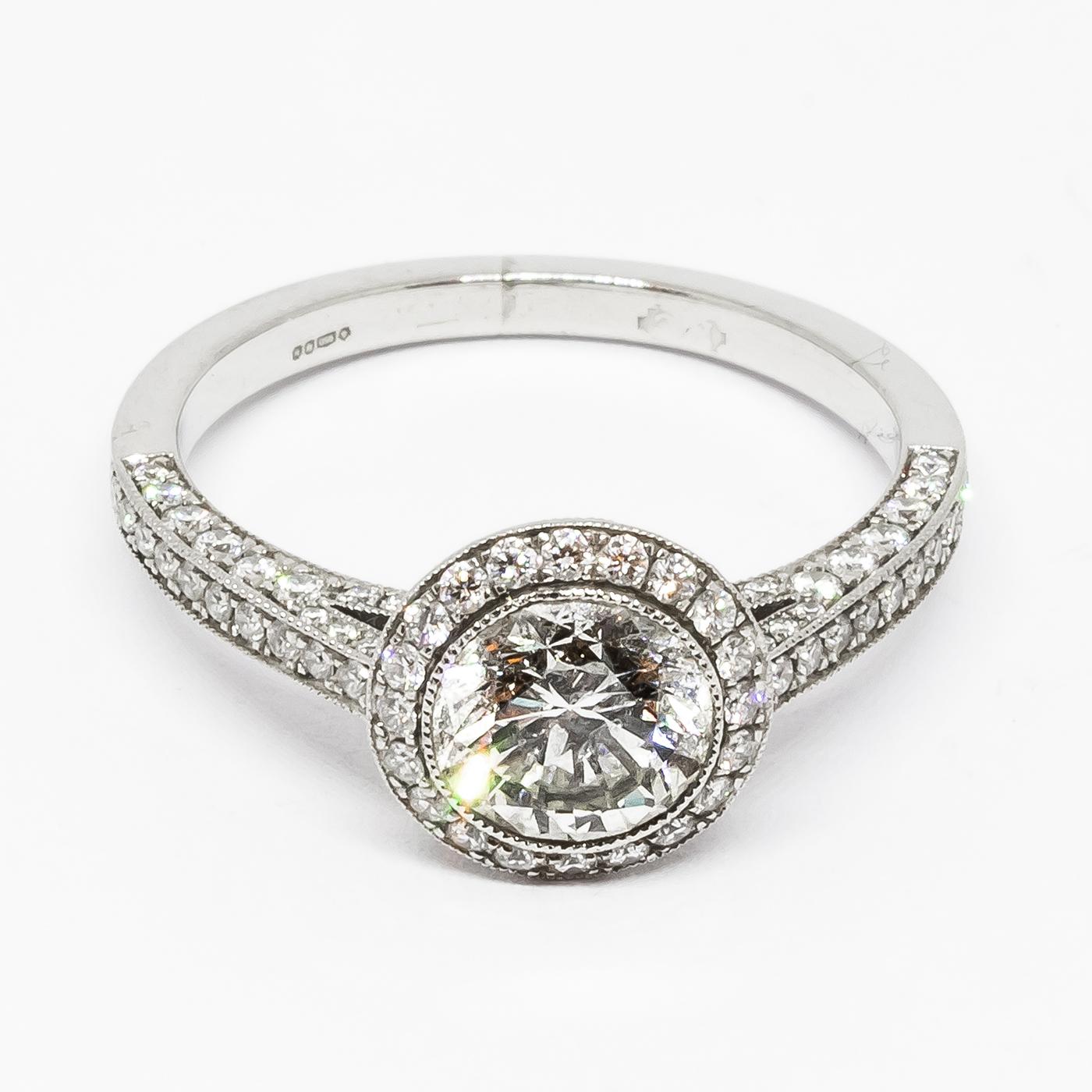 Brilliant Cut Modern Diamond and Platinum Micro Pavé Halo Ring, 0.94 Carats For Sale