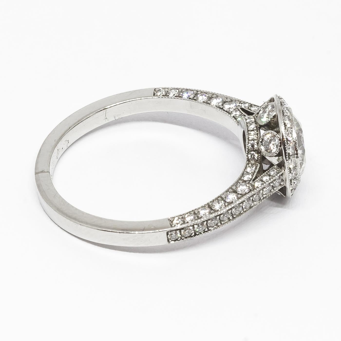 Women's Modern Diamond and Platinum Micro Pavé Halo Ring, 0.94 Carats For Sale