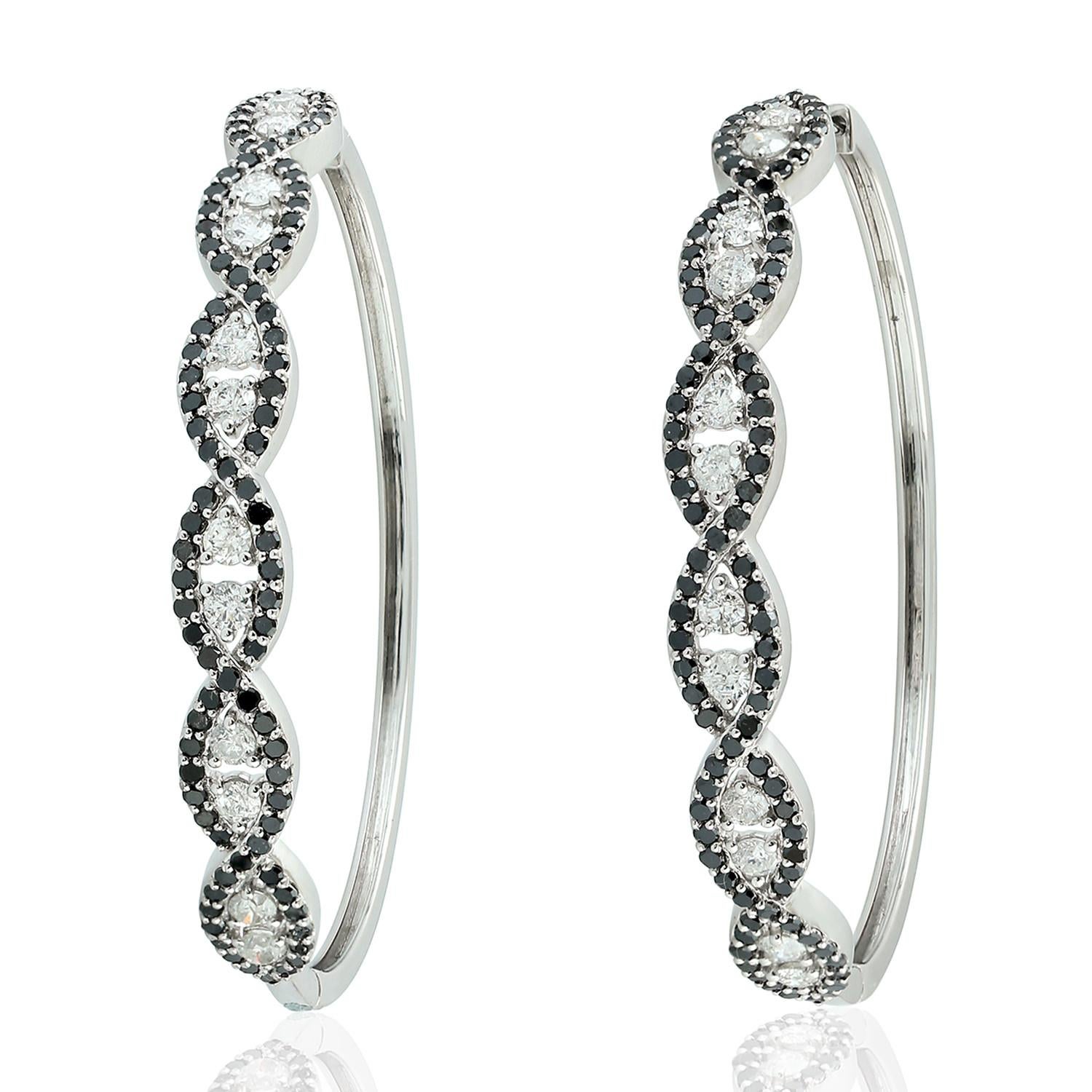 Contemporary Intertwined Two Tone Diamond Hoop Earrings For Sale