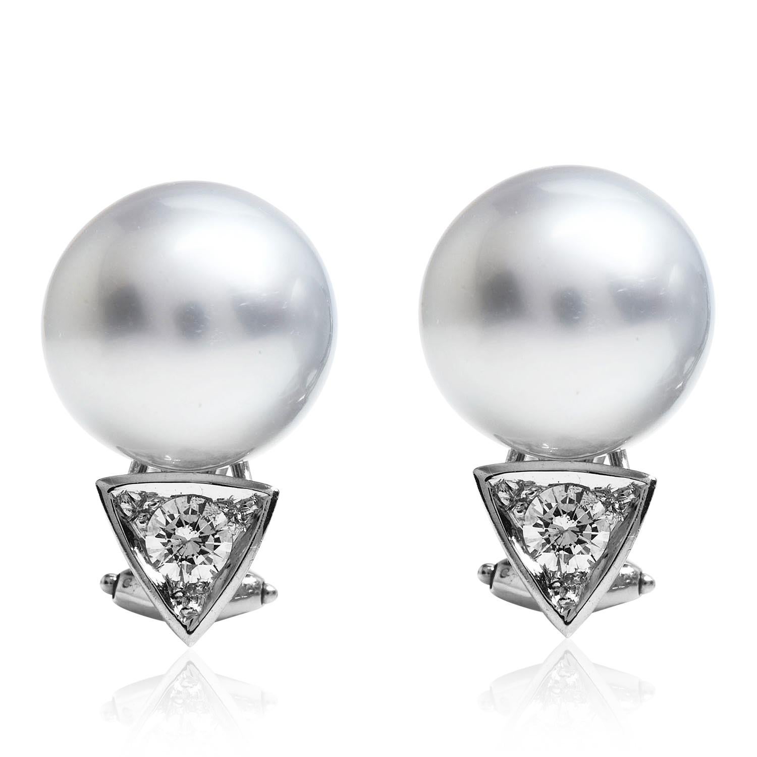 These elegant South Sea Pearl Clip Back Studs, Measuring 12.5mm each, These Gray Pearls are highly polished, and the light reflects from the almost unblemished surfaces.  Each Pearl is topped with a round cut, a prong set of Genuine