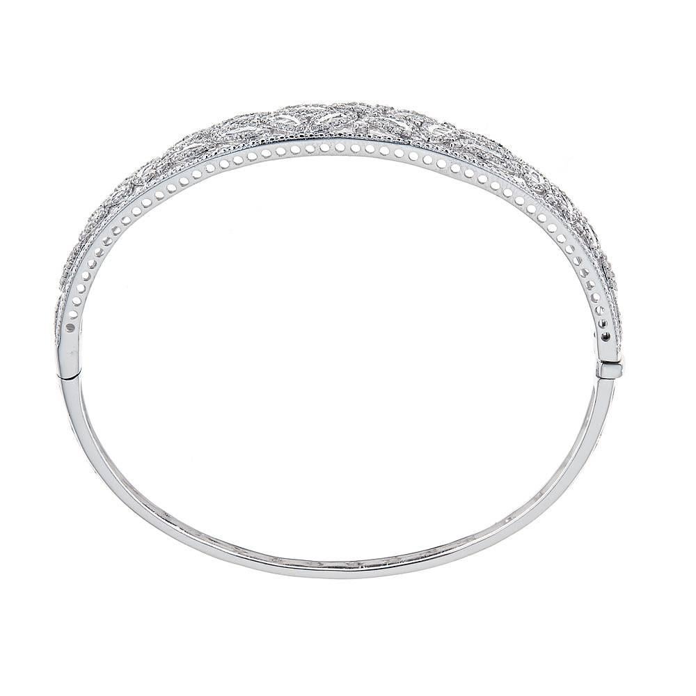  1.55 Carat Diamond Designer Bangle Bracelet 14 Karat White Gold Fine Jewelry

Vintage-inspired bangle bracelet. Featuring 1.55 TCW round glistening diamonds, encrusted on a wide top, creating a very dramatic look.  Fashioned in 14k White Gold,