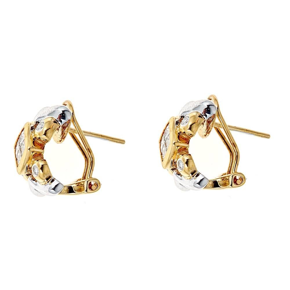 Handmade 14k two tone gold earrings with approximately .65 CT in round and princess cut diamonds (GH color, SI-SI2 clarity)