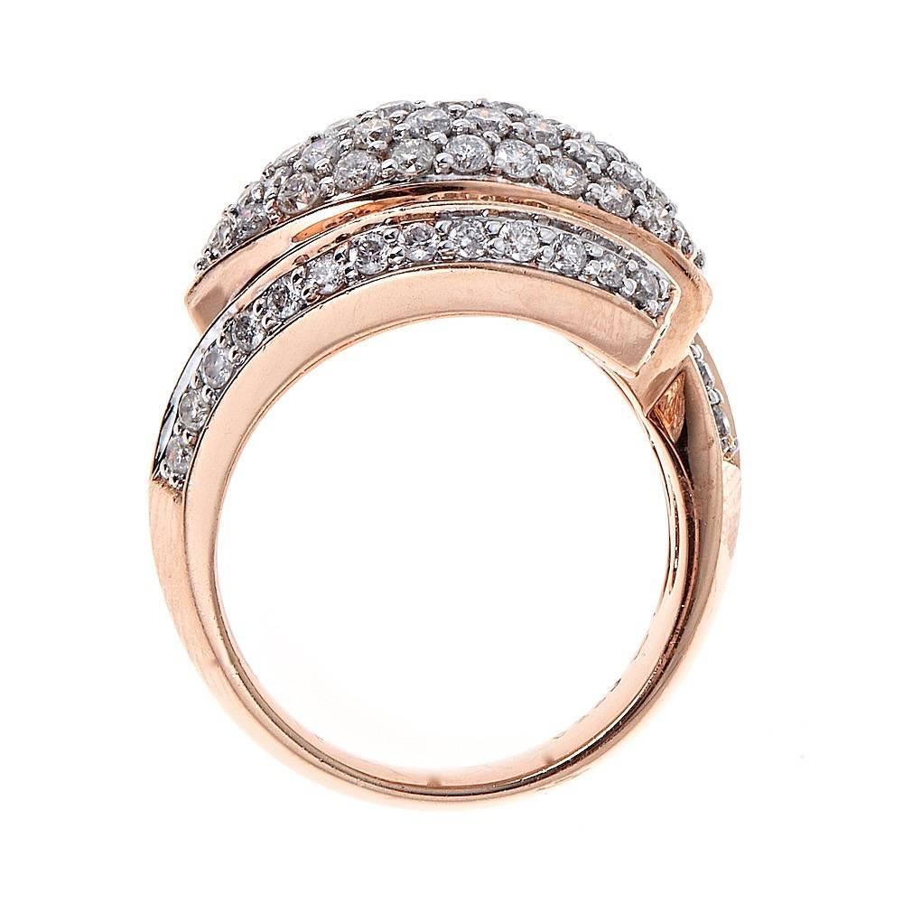 Stunning piece made in 14k rose gold accented with approximately 2.23 CT in round brilliant cut diamonds 