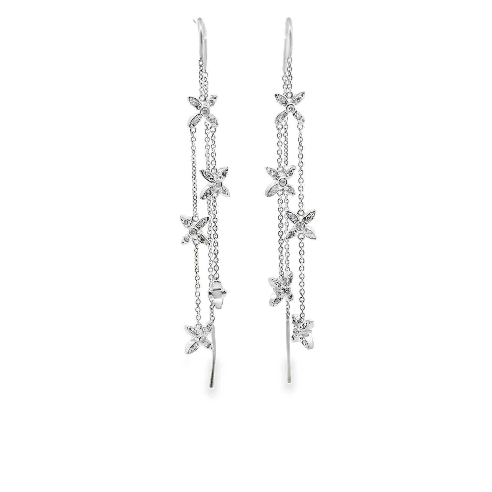 Orecchini moderni con diamante, in oro bianco 14 carati, con stella a penzoloni In condizioni ottime in vendita a Boca Raton, FL
